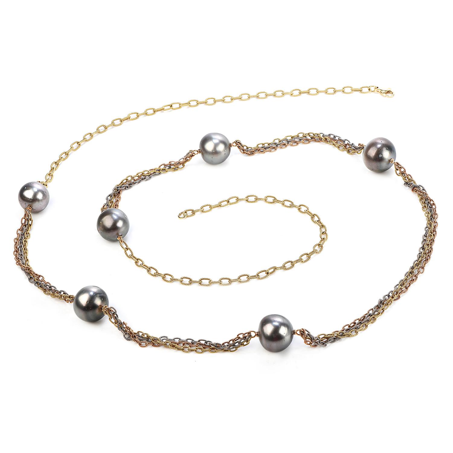 Large looking silvertone south sea pearls necklace, in a three-tone multi-chain design. 

Crafted in solid 18K yellow, white & rose gold links, this piece is formed by (6) gray color 15 mm South Sea Pearls, with natural blemishes & medium luster. 