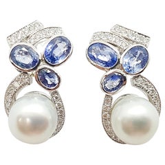 Boucles d'oreilles en or blanc 18 carats avec perles des mers du Sud et saphir bleu et diamants