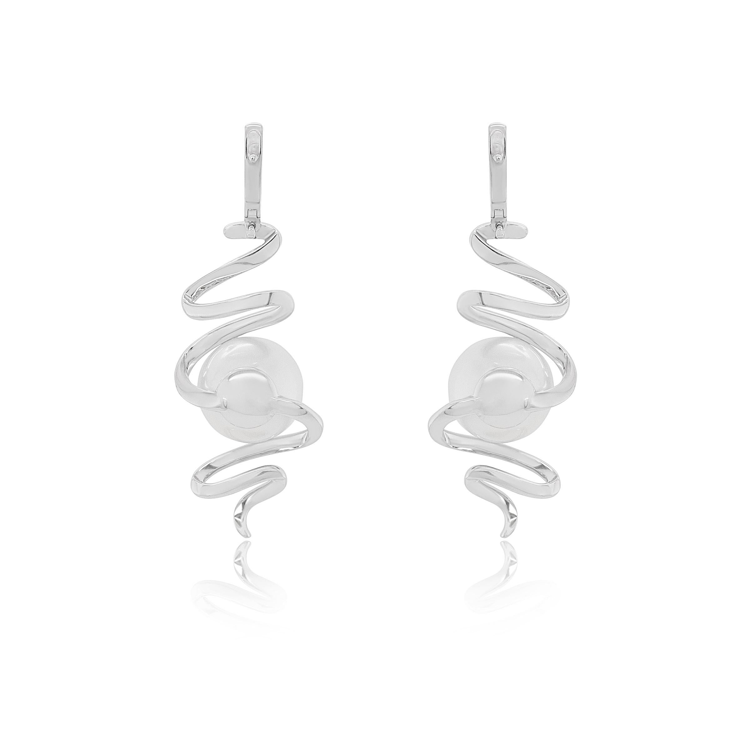 Discover elegance redefined with our exquisite South Sea pearl and diamond earrings, a testament to artisan craftsmanship and timeless sophistication. Each earring features a lustrous 12mm South Sea pearl embraced by a delicate spiral of pavéd