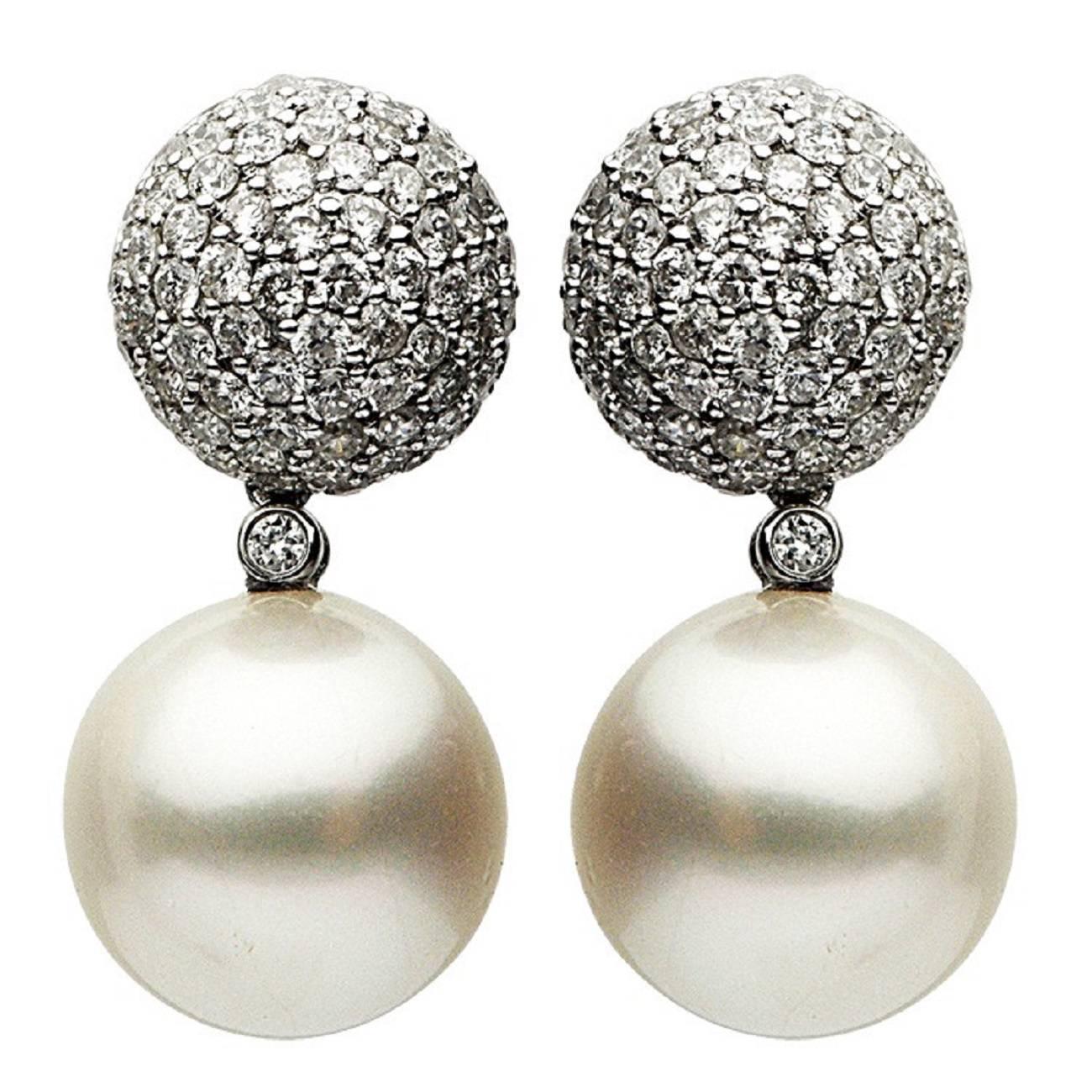 Metal; 18k white Gold
Pearl Size: 12-13mm White Gold
Pearl quality: AAA
Pearl Luster: AAA Excellent
Nature: South Sea Cultured Pearl
Nacre : Very Thick
Diamond Weight; 2.56 Cts.
Diamond Color: G+

