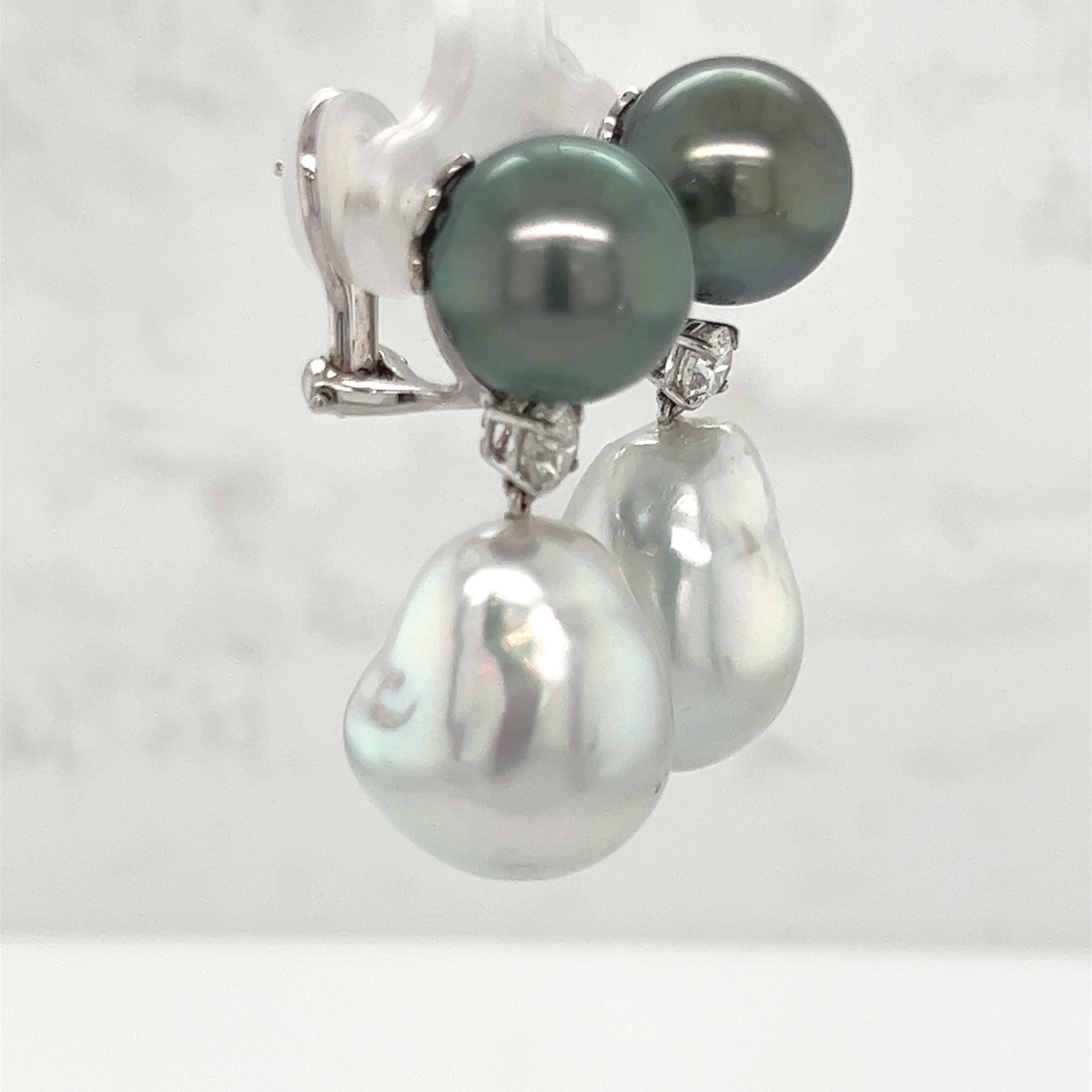 South Sea Pearl and Diamond Earrings with 14.00-12.00mm pearls. The top pearl is Tahitian and the bottom pearl is silvery-white Baroque. the earrings are 1 1/4