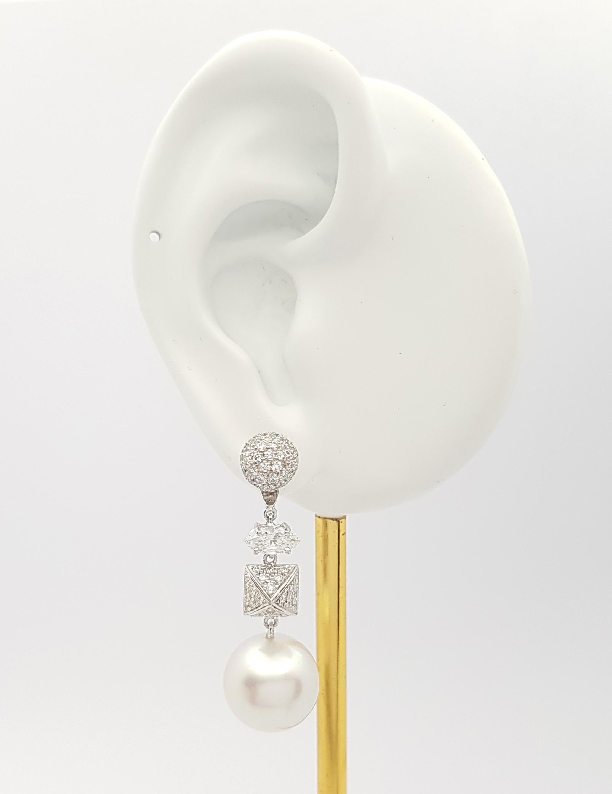 South Sea Pearl and Diamond 3.13 carats Earrings set in 18K White Gold Settings

Width: 1.3 cm 
Length: 4.1 cm
Total Weight: 14.53 grams
South Sea Pearl 13 mm

