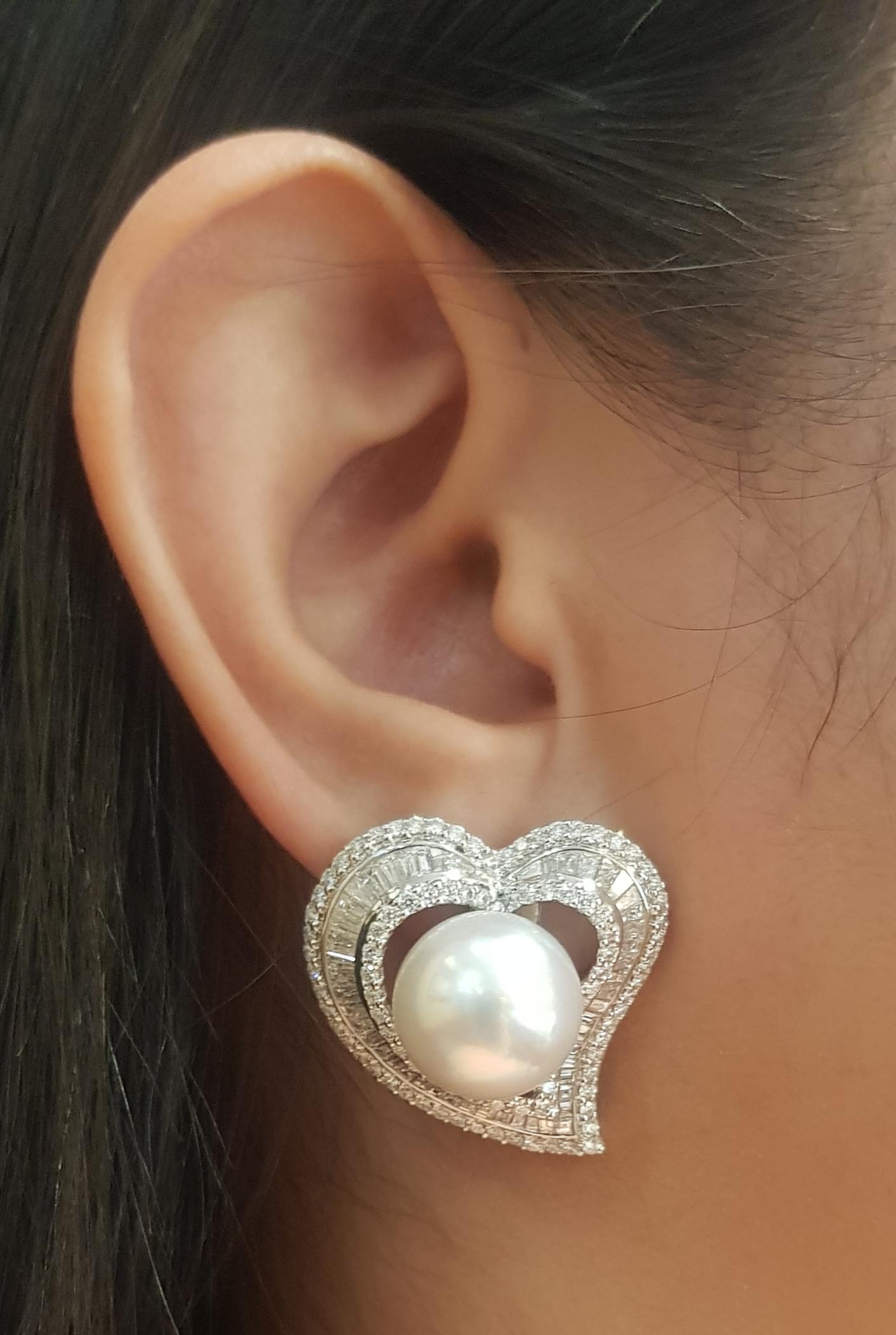 South Sea Pearl and Diamond 3.32 carats Earrings set in18K White Gold Settings

Width: 2.7 cm 
Length: 2.9 cm
Total Weight: 21.78 grams

