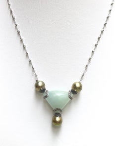 Collana con perle dei mari del sud, acquamarina e diamanti neri in oro bianco 18 carati