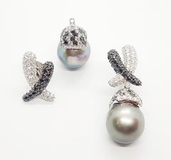 Orecchini staccabili con perle dei mari del sud, diamanti bianchi e neri in oro bianco 18 carati