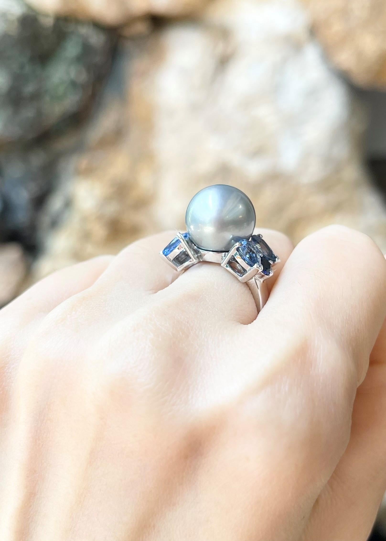 South Sea Pearl, Blue Sapphire 2.79 carats and Aquamarine 0.53 carat Ring set in 18K White Gold Settings

Width:  2.0 cm 
Length: 1.3 cm
Ring Size: 52
Total Weight: 9.55 grams


