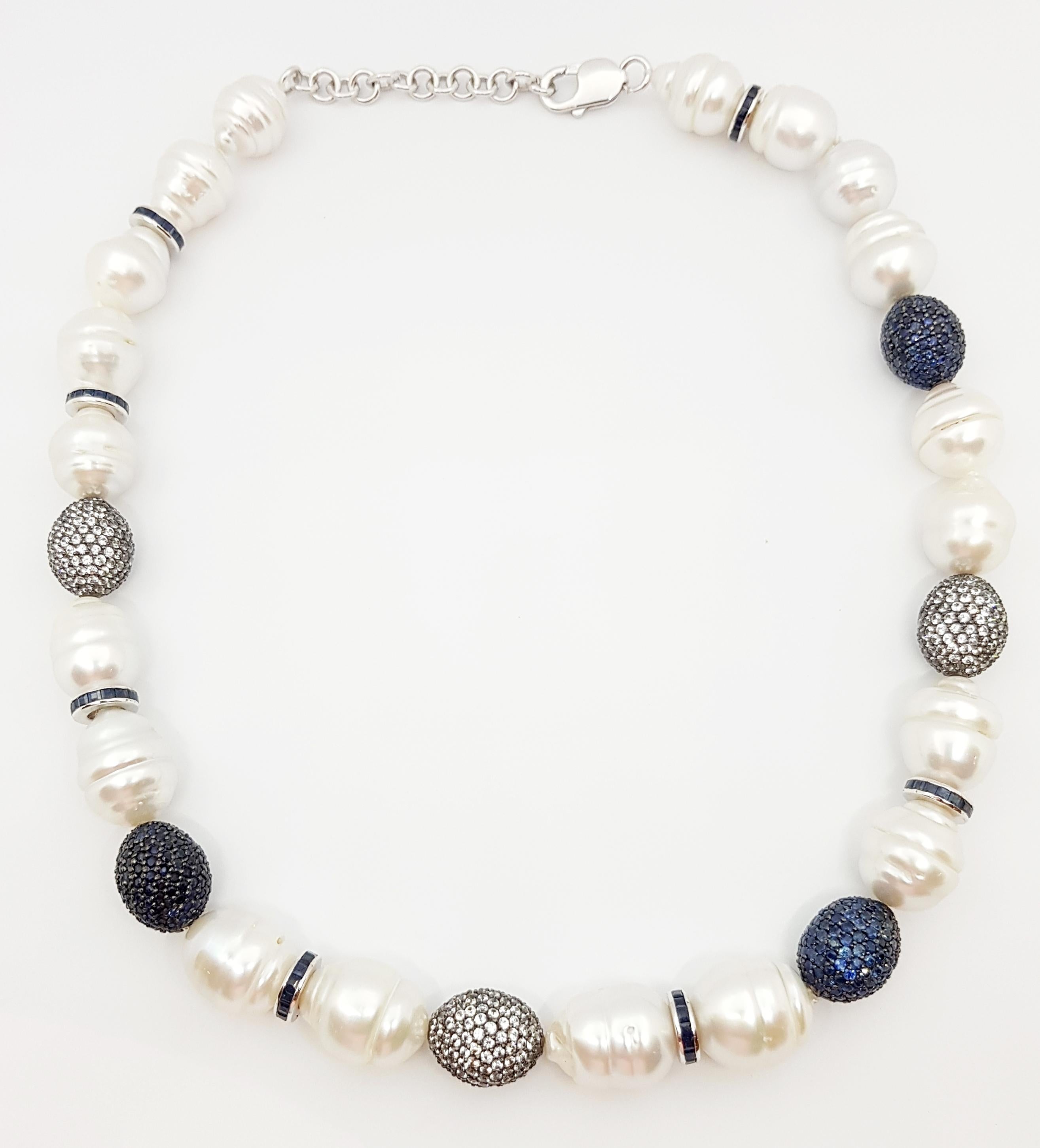South Sea Pearl, Blue Sapphire, White Sapphire Necklace set in Silver Settings

Width:  1.4 cm 
Length:  51.0 cm
Total Weight: 116.33 grams

*Please note that the silver setting is plated with rhodium to promote shine and help prevent oxidation. 