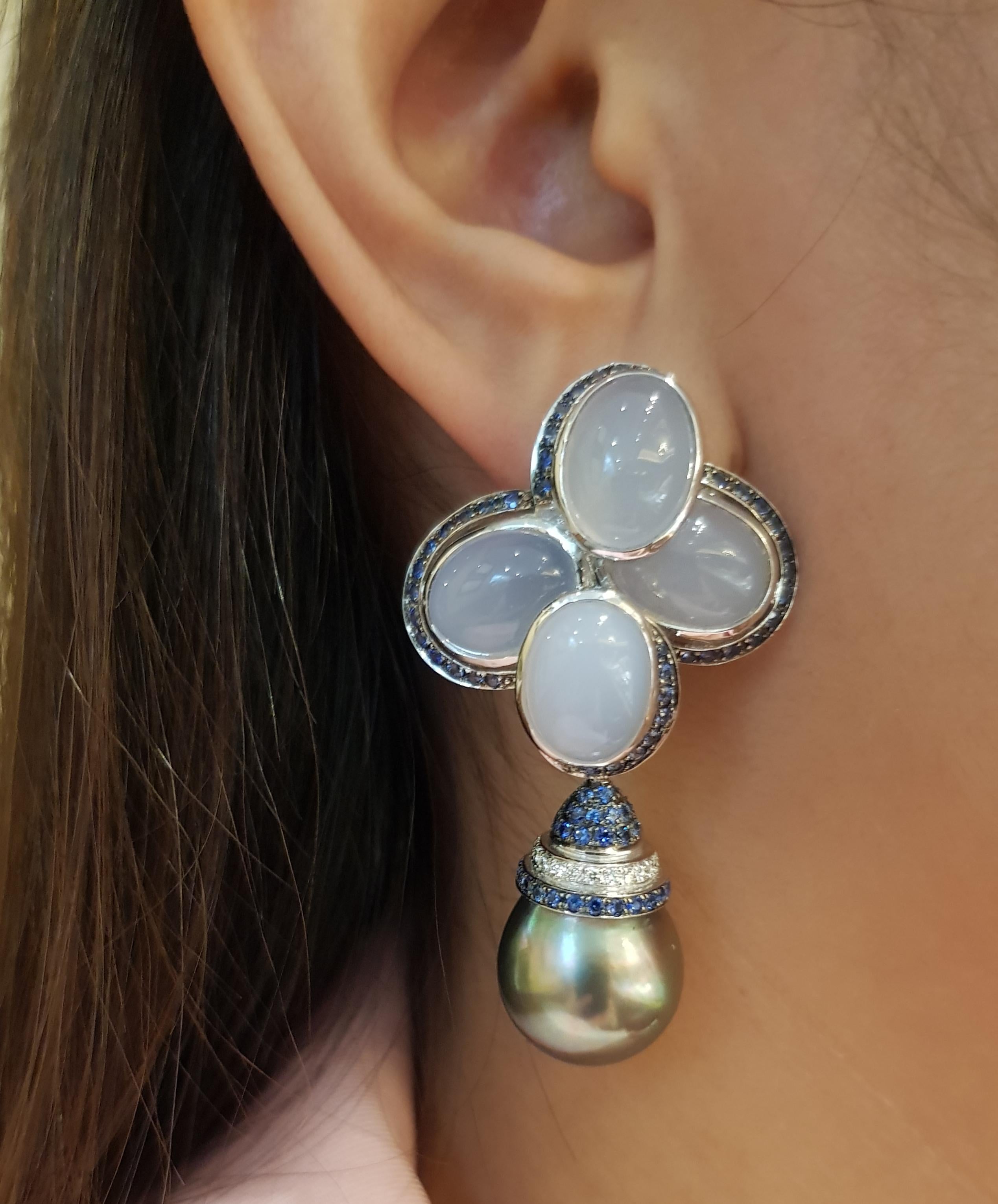 South Sea Pearl, Chalcedony 30.98 carats, Blue Sapphire 2.19 carats and Diamond 0.21 carat Earrings set in 18 Karat White Gold Settings

Width:  3.1 cm 
Length:  5.2 cm
Total Weight: 37.62 grams

