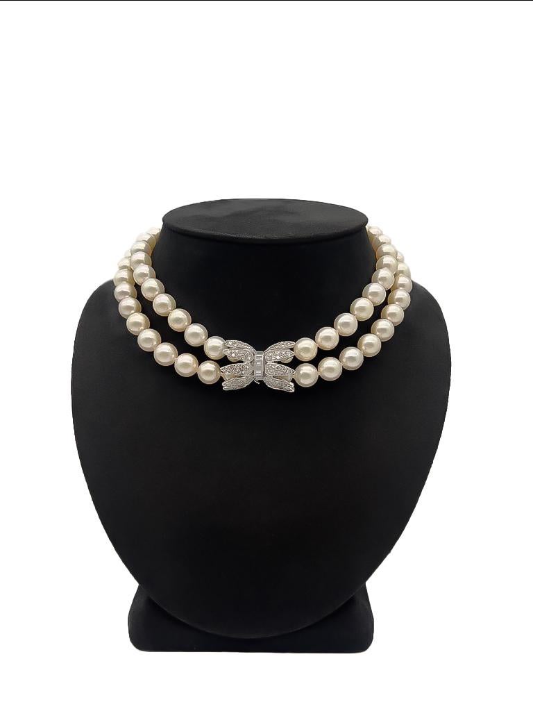 Introducing the exquisite South Sea Pearl Choker Necklace in 18K White Gold. This unique piece boasts a stunning 18K White Gold slide-in Lock encrusted with 2.25CT in BG/RB Diamonds, making it a total standout. Weighing 102.7 grams, this necklace is