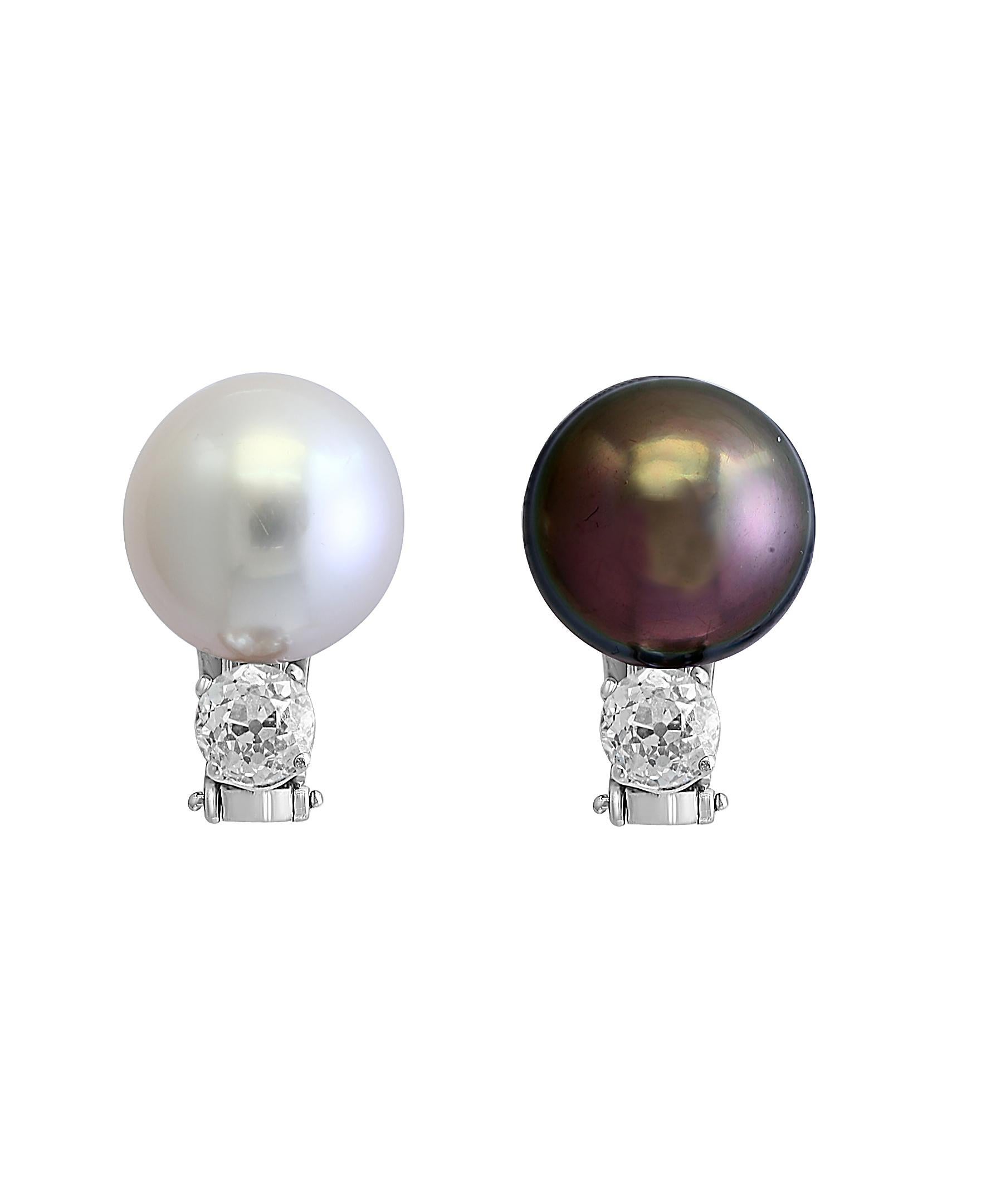 South Sea Pearl Day & Night with solitaire  Diamond Cocktail Earrings 18 K White Gold , 
Beautiful estate piece which comes with total of three pearls .
one would have a choice to wear white and white pearls in both ears or 
you can unscrew one of