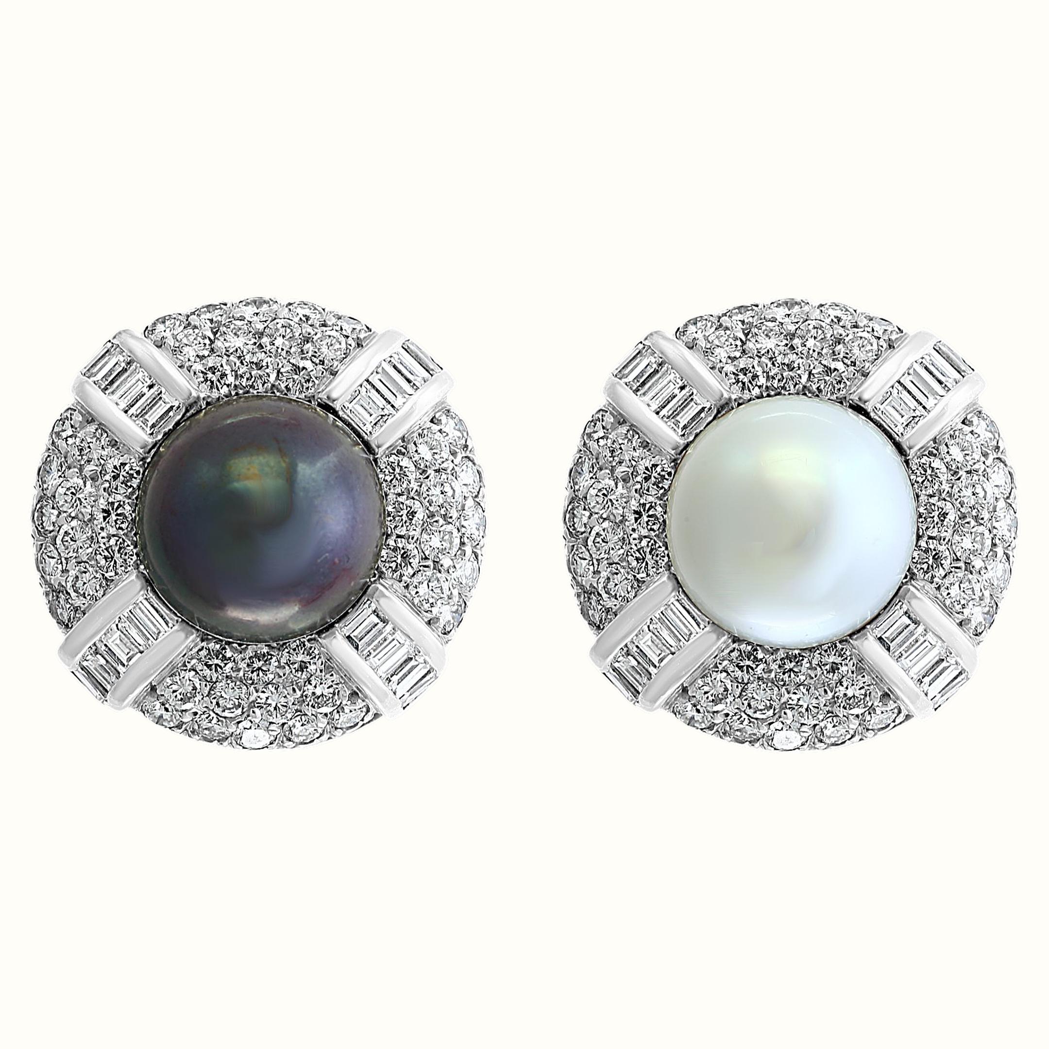 South Sea Pearl Day & Night with 12 Carats Diamond Cocktail Earrings 18 K White Gold , 
Beautiful estate piece
 one South Sea white Pearl and one Tahitian black Pearl
both pearls are absolutely clean with no blemishes .
Pearls are surrounded by 12