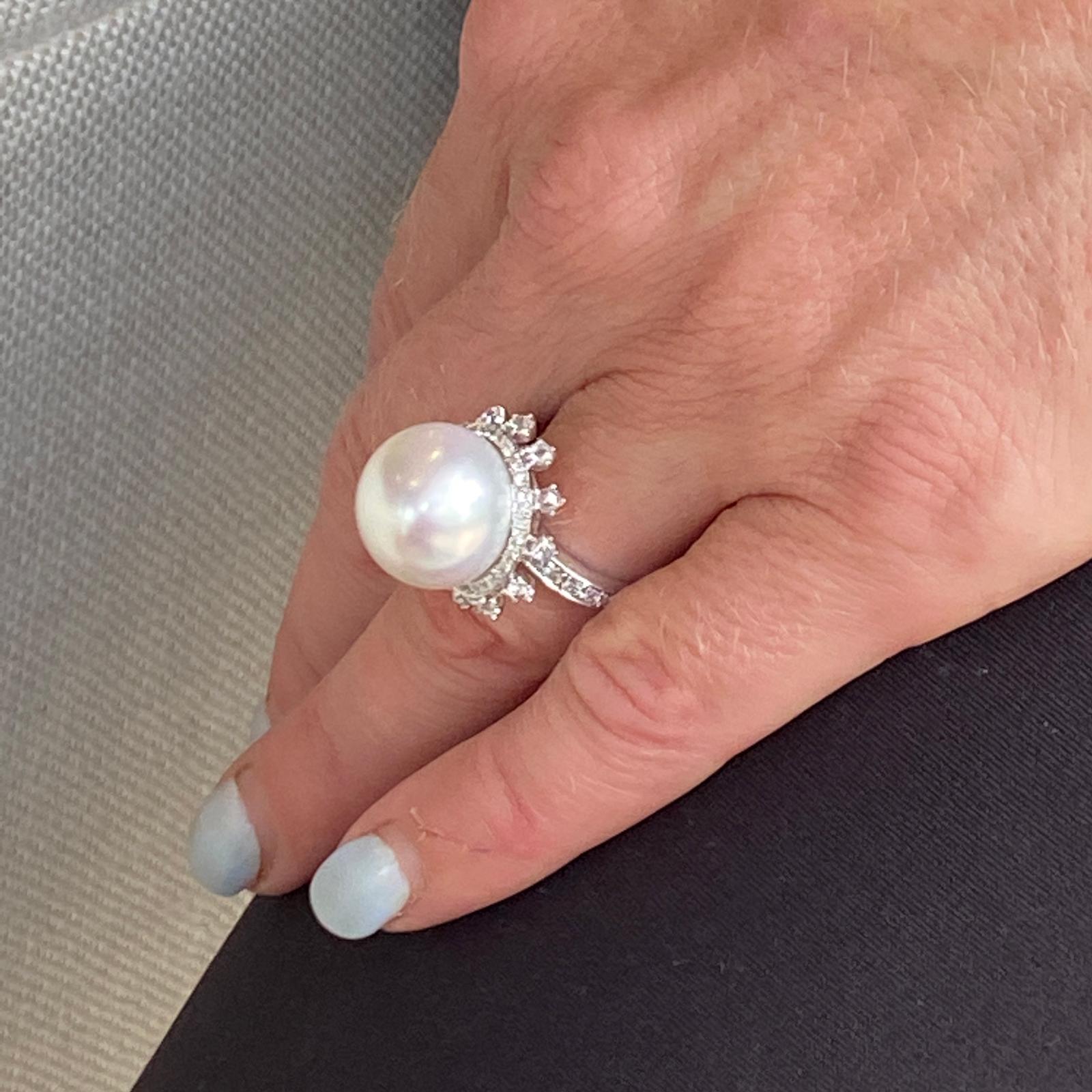 Beautiful South Sea Pearl and diamond ring fashioned in 18 karat white gold. The 14.5mm South Sea Pearl is surrounded by diamonds weighing 1.00 carat total weight and graded G-H color and SI clarity. The ring is currently sie 5.5 (can be sized). 