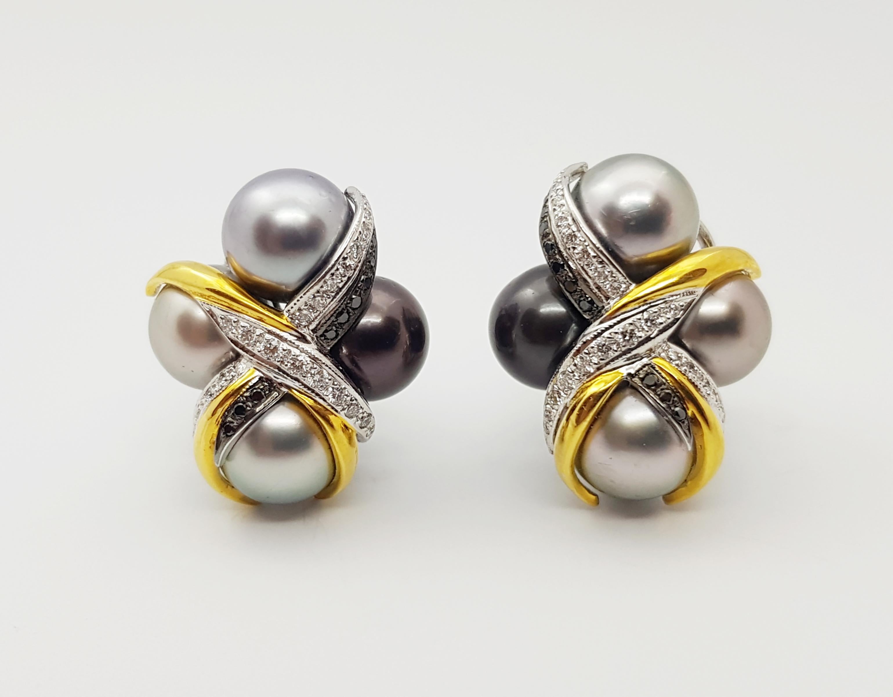 South Sea Pearl, Diamond 0.42 carat and Black Diamond 0.15 carat Earrings set in 18 Karat White Gold Settings

Width:  2.1 cm 
Length:  2.5 cm
Total Weight: 24.51 grams

