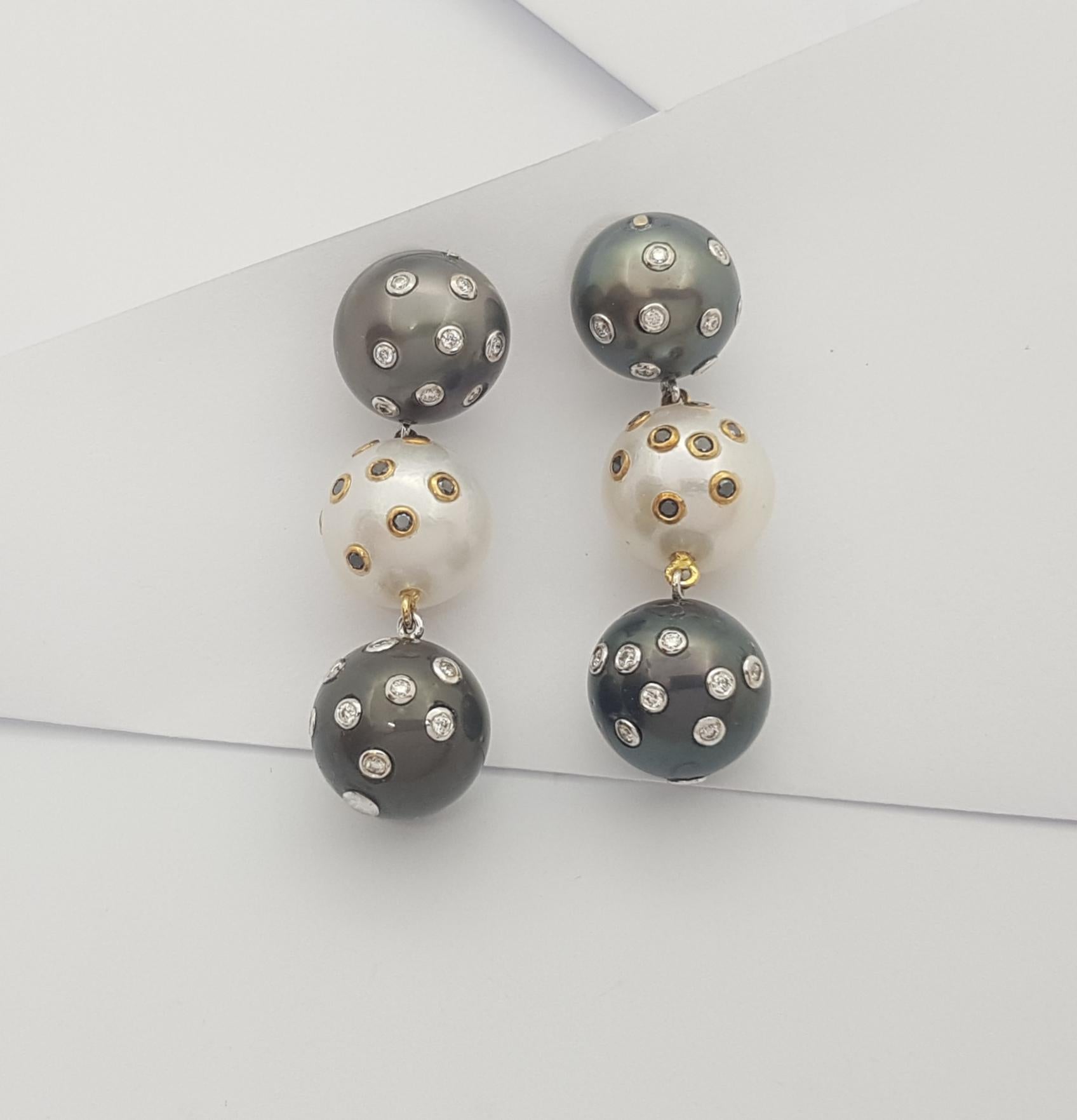 Brilliant Cut South Sea Pearl, Diamond and Black Diamond Earrings Set in 18k Gold Settings For Sale