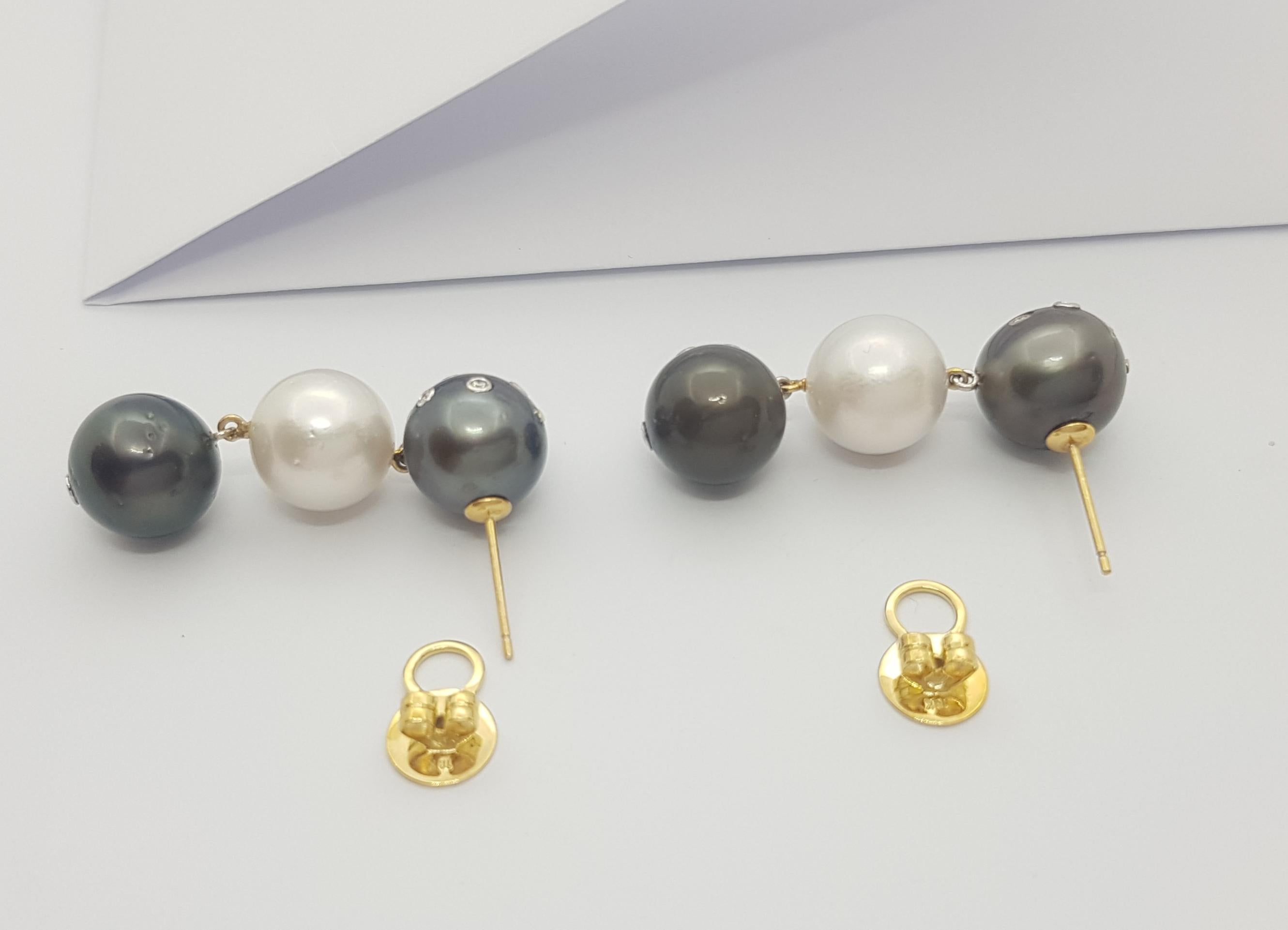 South Sea Pearl, Diamond and Black Diamond Earrings Set in 18k Gold Settings In New Condition For Sale In Bangkok, TH