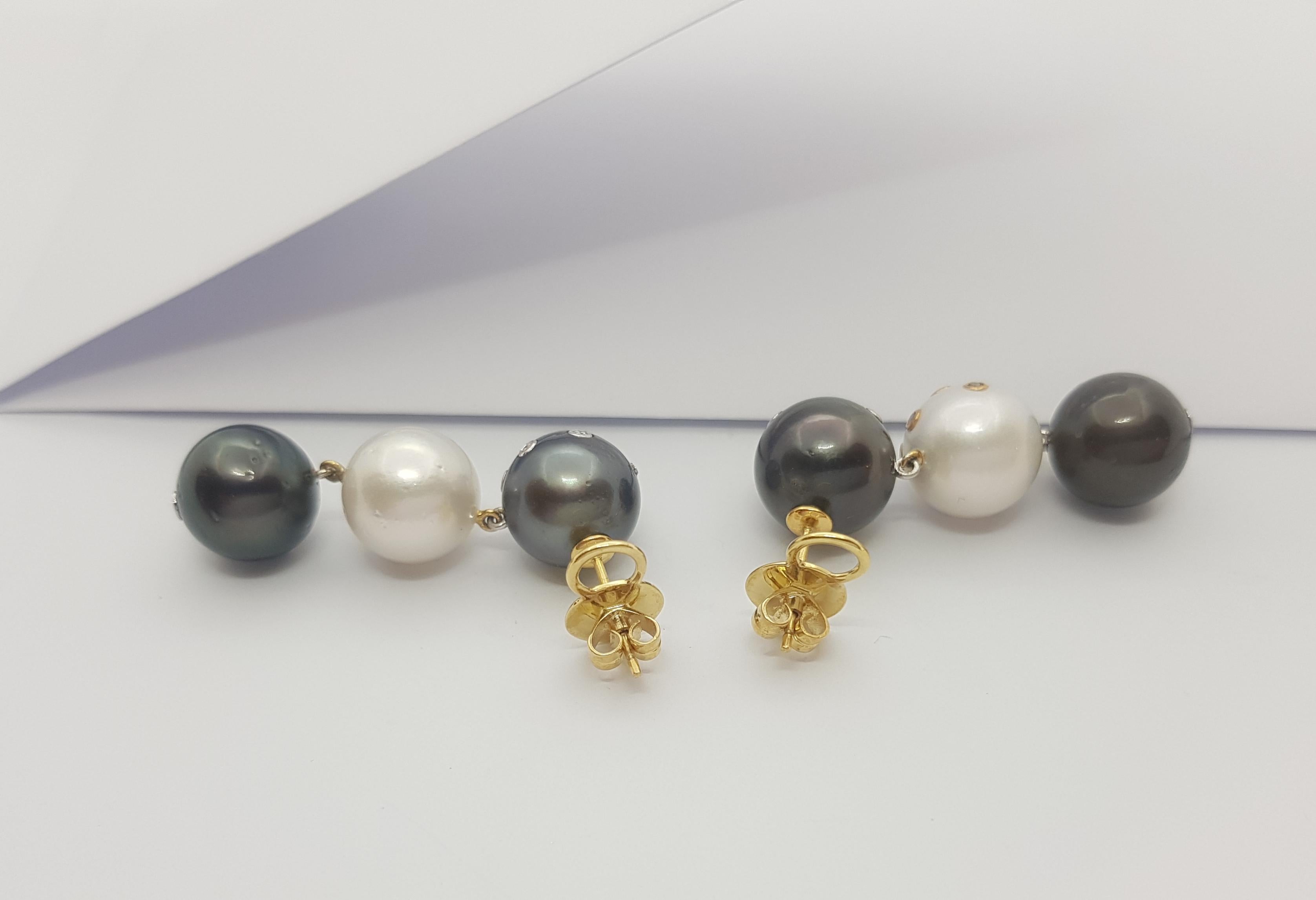 Women's South Sea Pearl, Diamond and Black Diamond Earrings Set in 18k Gold Settings For Sale