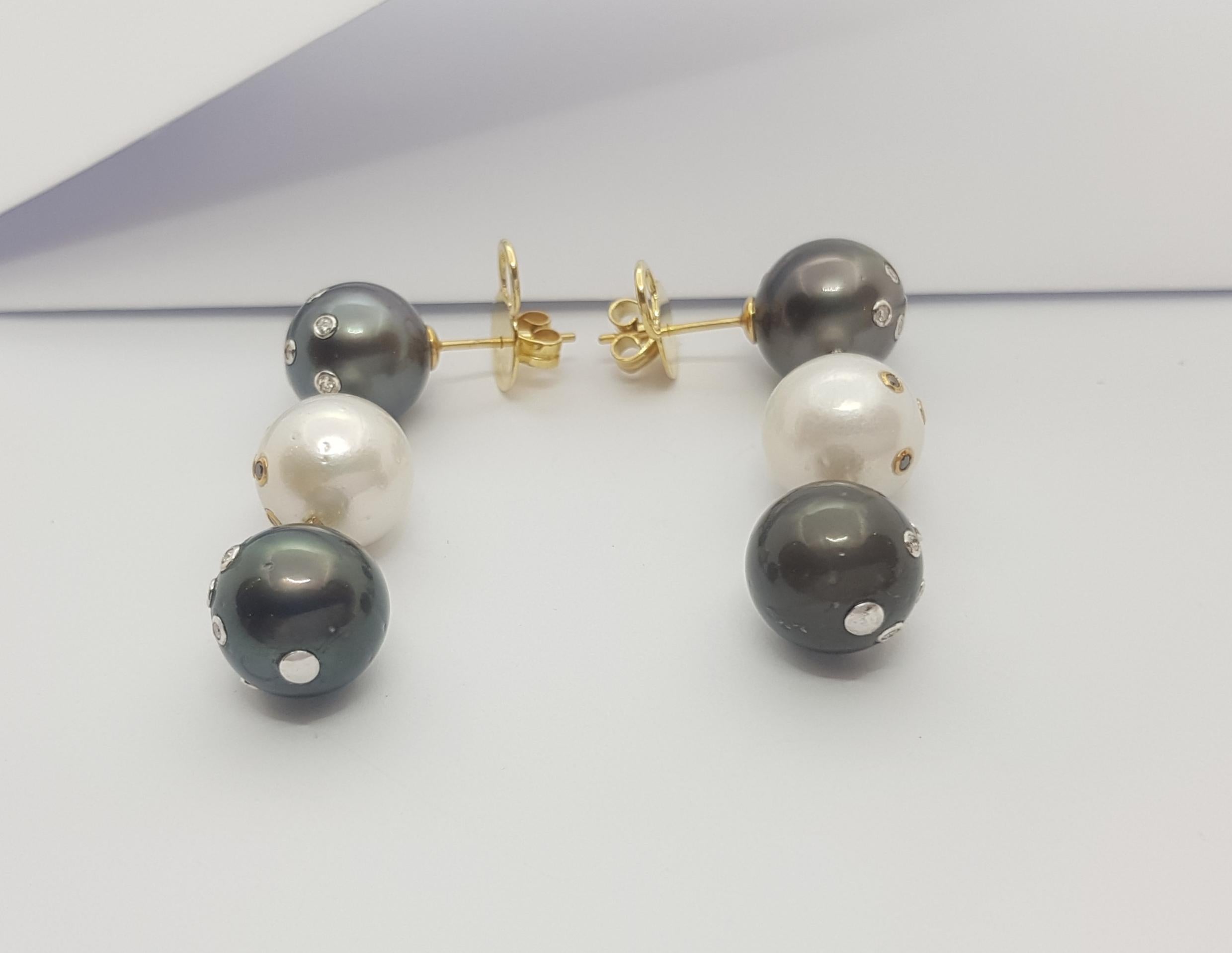South Sea Pearl, Diamond and Black Diamond Earrings Set in 18k Gold Settings For Sale 1