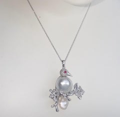 South Sea Pearl, Diamond and Ruby Bird Pendant set in 14K White Gold Settings