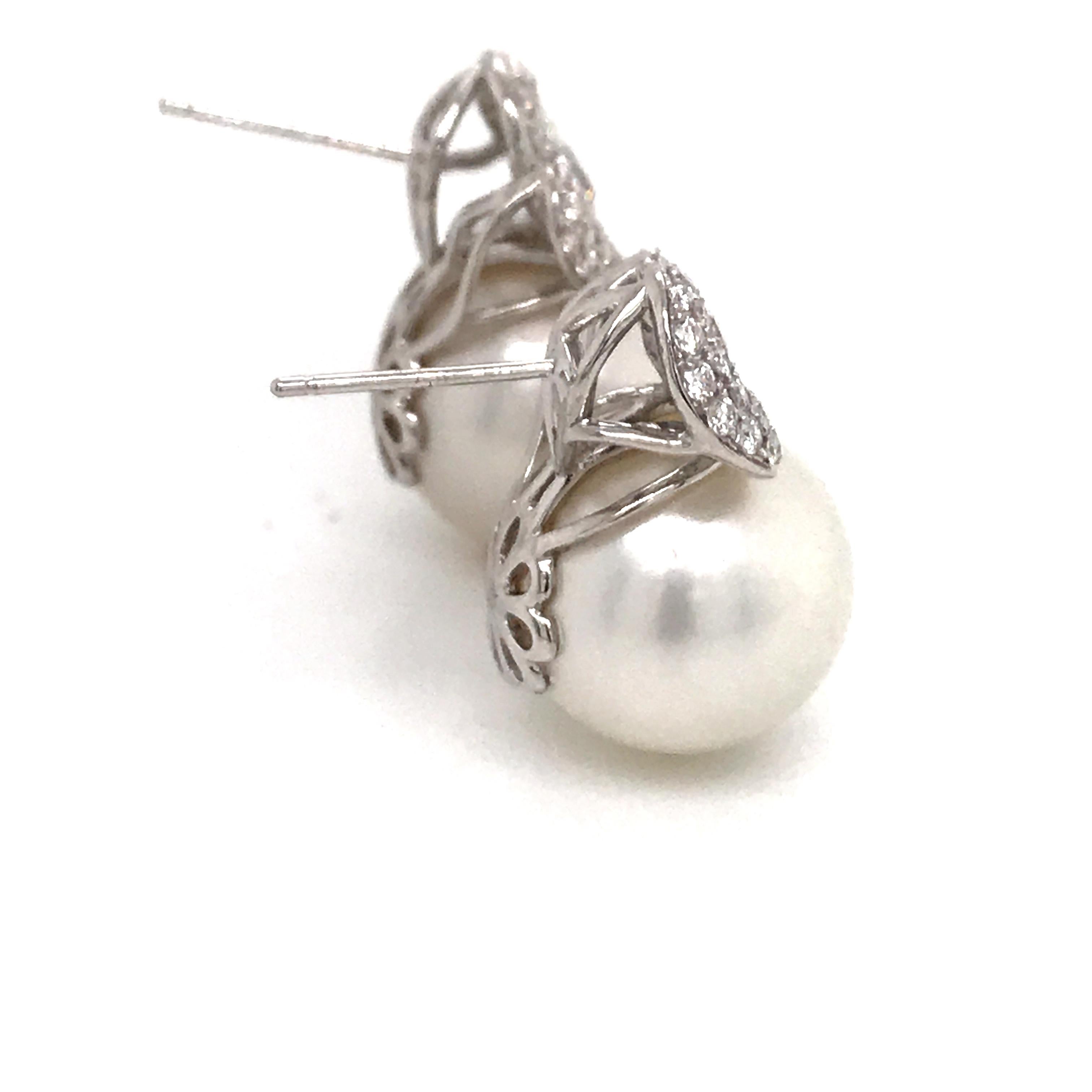 18kt white gold and diamond seaquin dangle earrings with south sea pearl drops