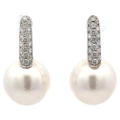 Boucles d'oreilles pendantes perle des mers du sud diamant 0.61 carats or blanc 18 carats 12-13 MM