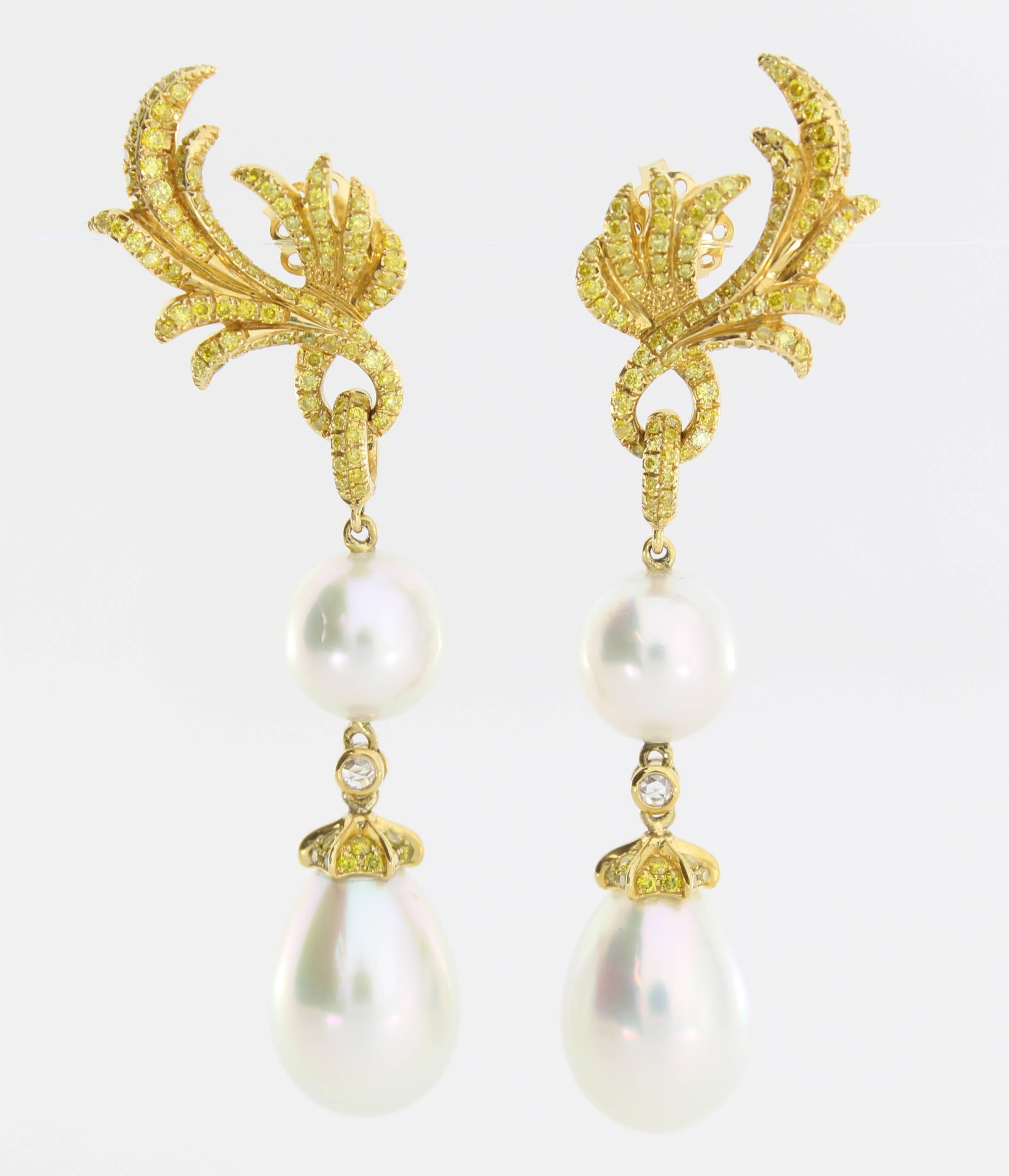 The Versailles Earrings are from the AUTORE Metropolitan Collection and are inspired by the Palace de Versailles in France. The piece is crafted in 18k Yellow Gold with Yellow Diamonds (1.25ct Brilliant Cut), White Diamonds (H SI 0.047ct Rose Cut),