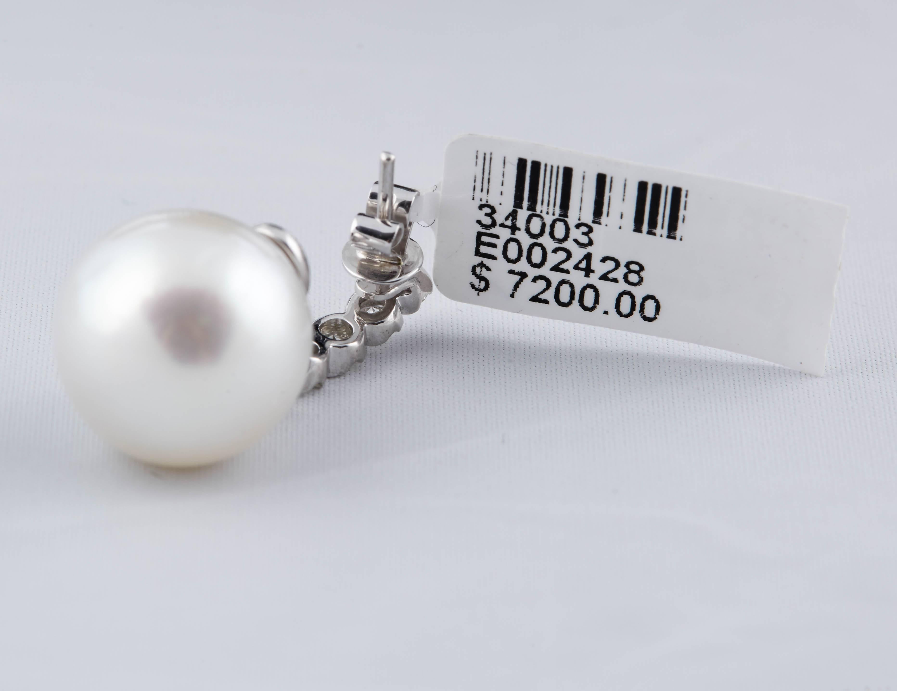 or blanc 18K
Diamants 0,72 carats
perle des mers du Sud 13-14 mm