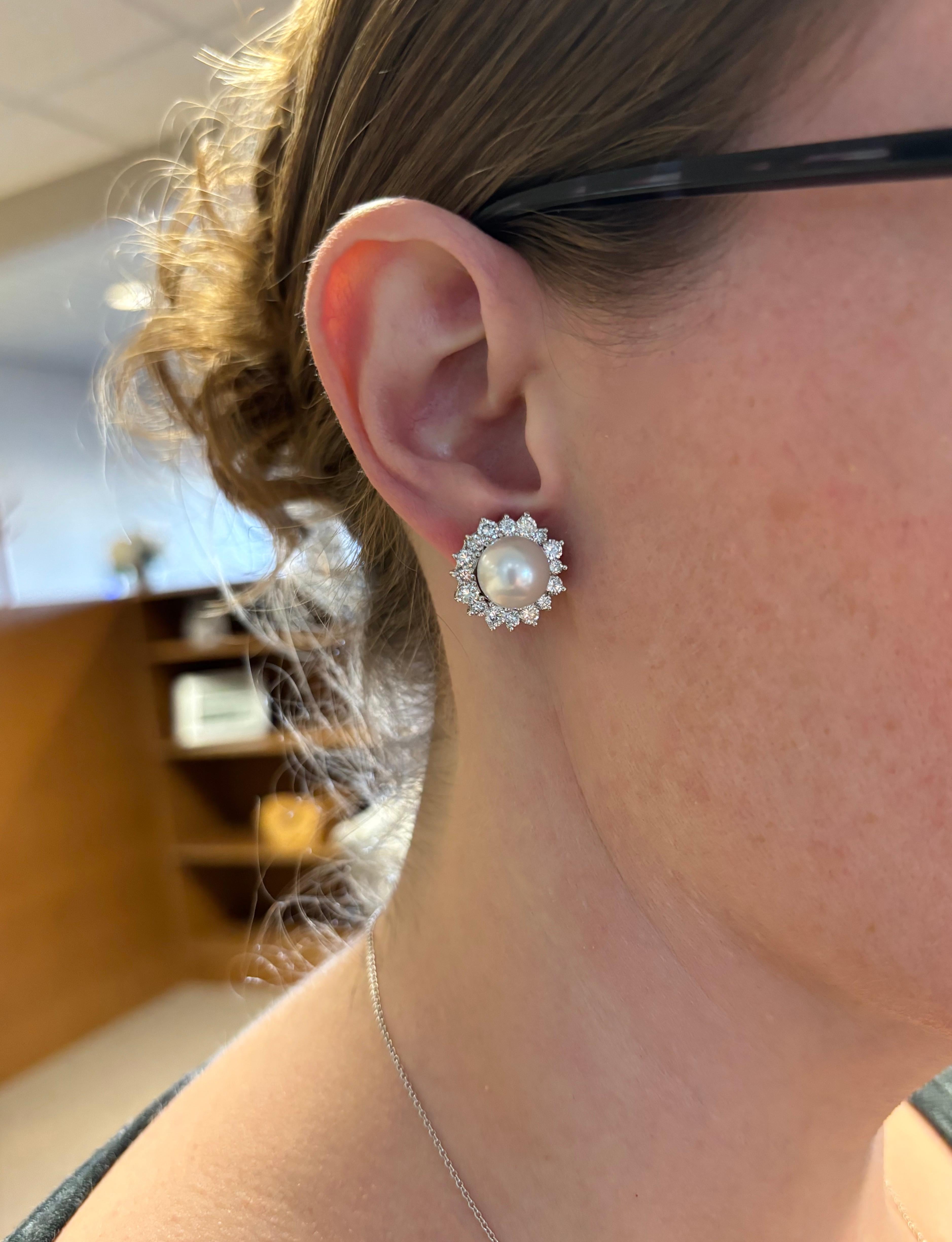 Elegant South Sea Pearl & Diamond Omega back earrings. 

Gemstone: Earth Minded Diamonds & South Sea Pearls
Pearl Size: 10.4mm 
Diamond Carat Weight: 2.72CTW 
Diamond Cut: Round Brilliant Cut 
Color: Average F-H
Clarity: Average VS-SI
Metal: 14K
