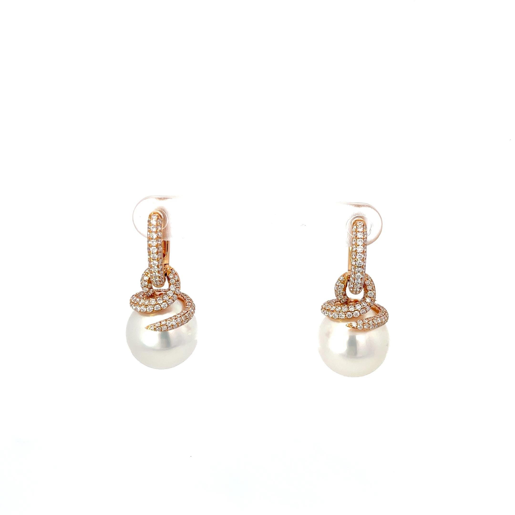 South Sea Pearl and Diamond Earrings in 18K Rose Gold. The earrings feature 14-15mm south sea pearls accented by 1.55ctw of brilliant round diamonds.