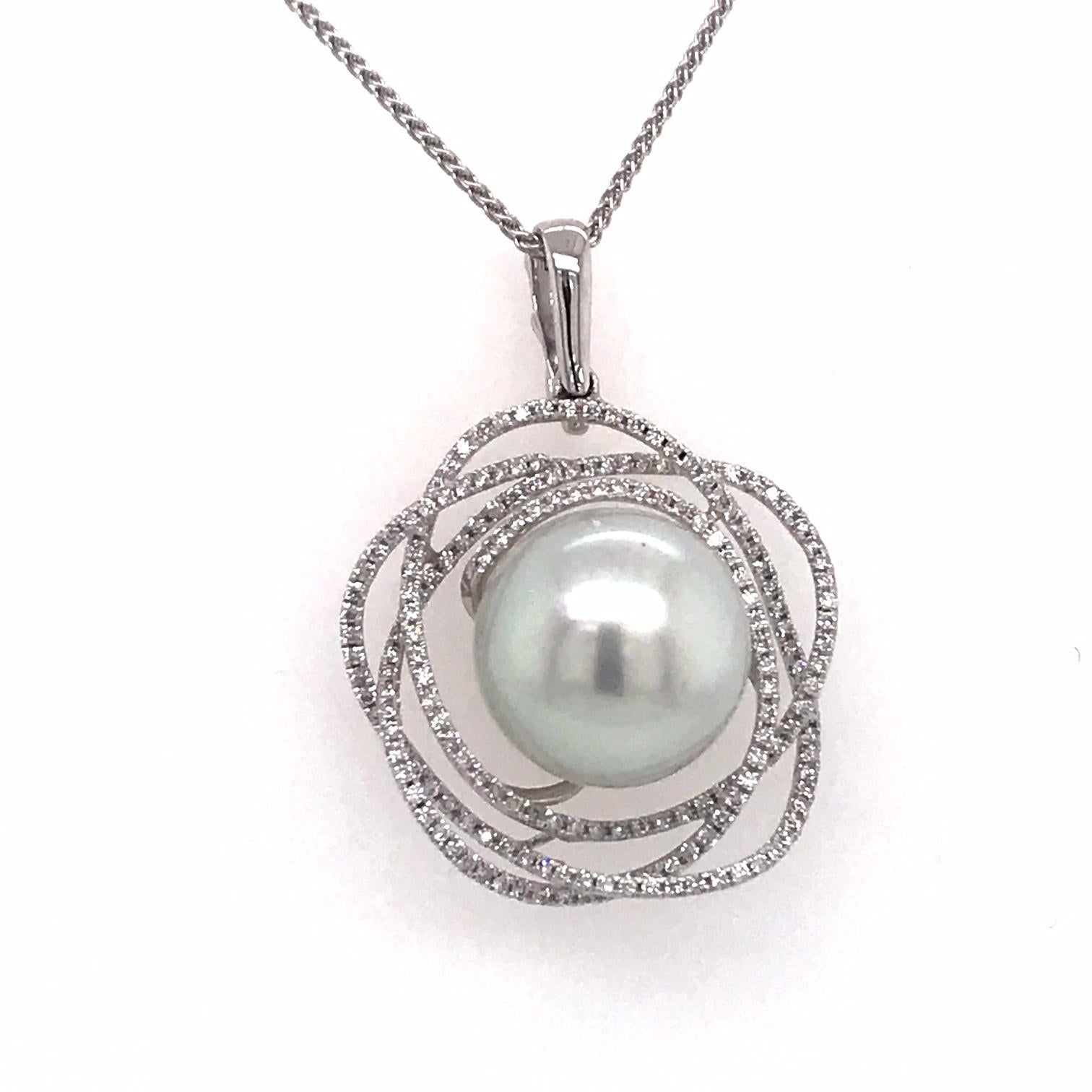 18K White gold pendant featuring one South Sea Pearl measuring 13-14 mm flanked with 186 round brilliants weighing 0.68 carats. 
Color G-H 
Clarity SI

Pearl can be changed to a Pink, Golden or Tahitian Pearl upon request. Price subject to change.