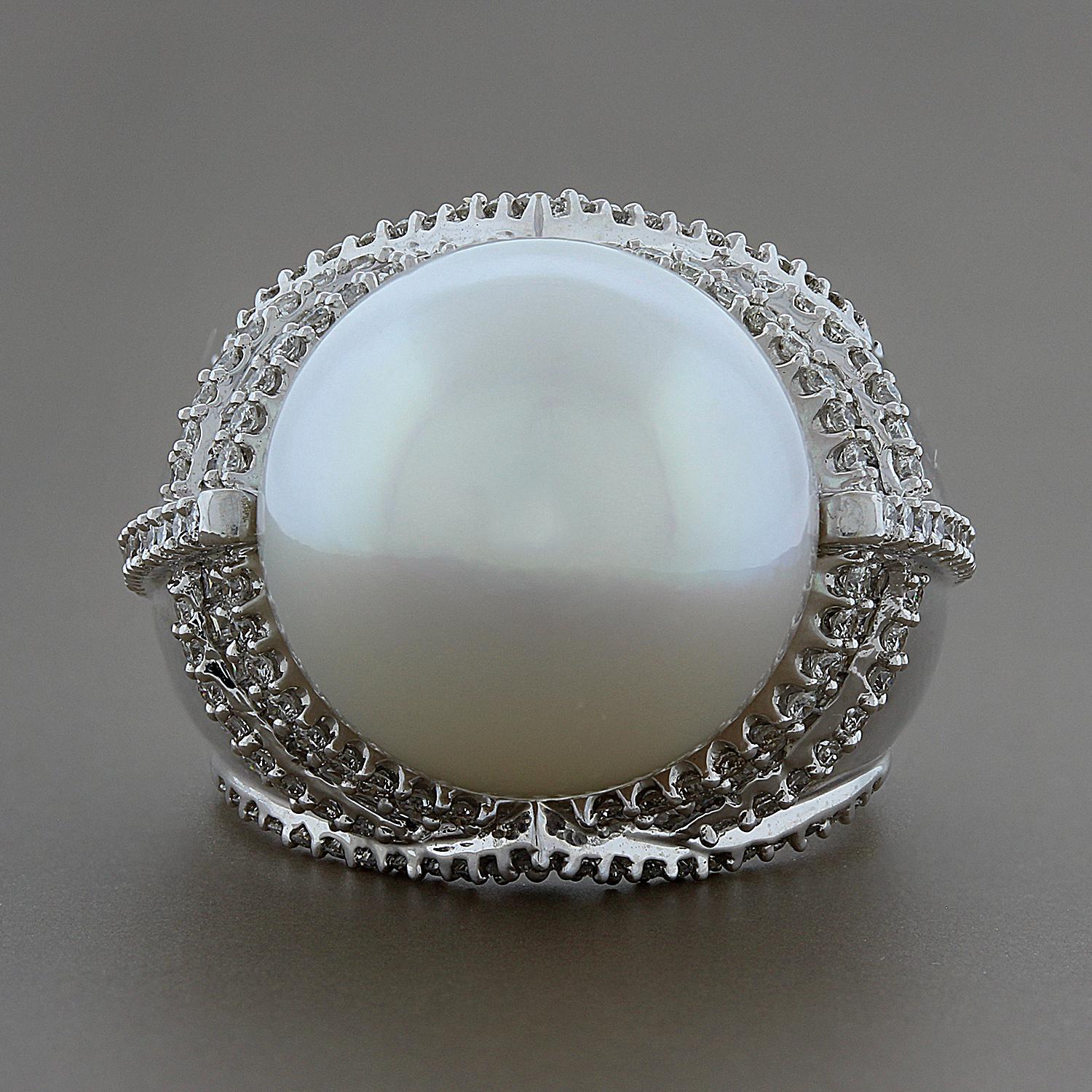 A classic cocktail ring featuring a 15.5mm South Sea Pearl with strong luster. There are 1.73 carats of round cut diamonds set in 18K white gold to accent the lovely ring. 
Size 7 ¼ 
