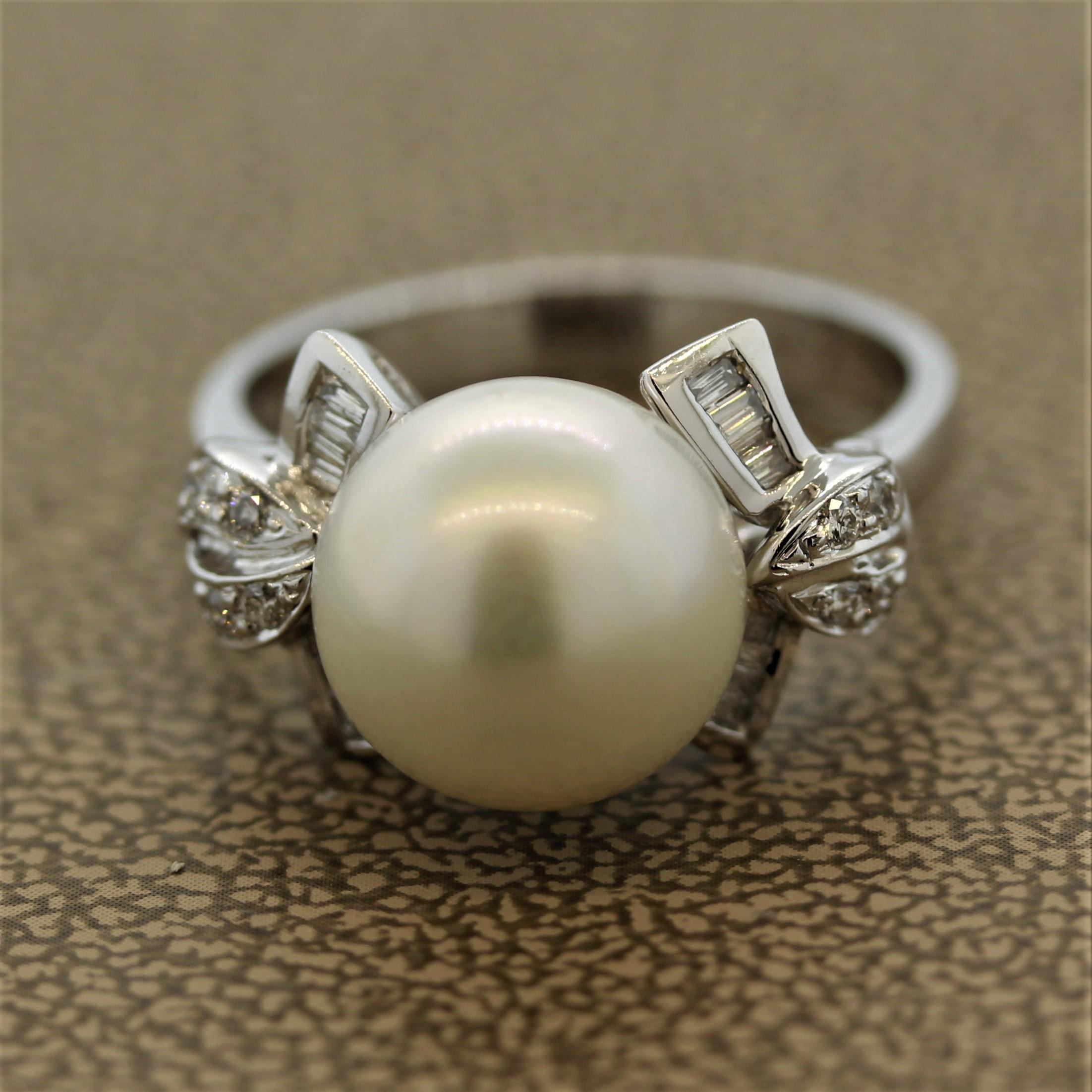 A sweet South Sea pearl ring that can be worn every day. The round smooth pearl measures 10.5mm and has an excellent luster. It is accented by 0.22 carats of round and baguette cut diamonds et in 18k white gold.

Ring Size: 6.75