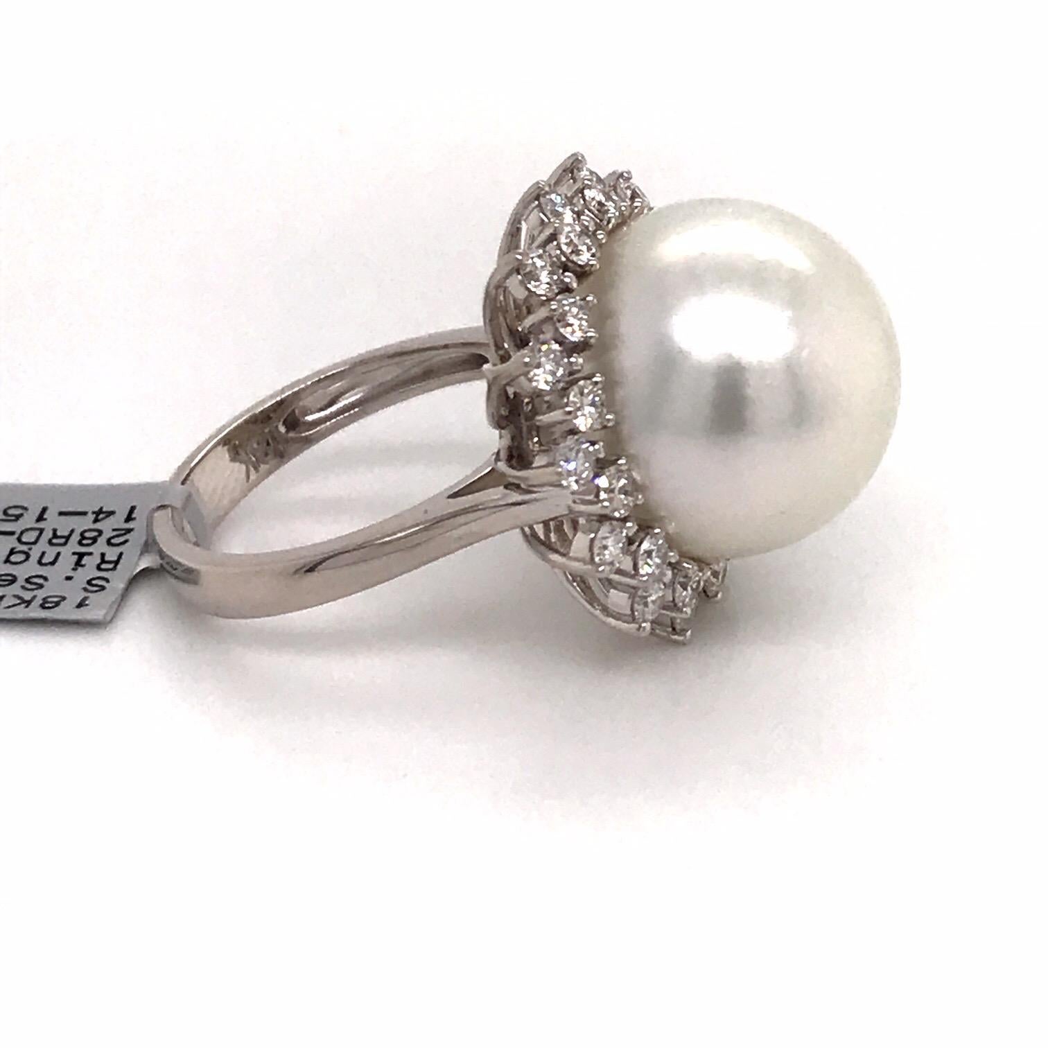 18K White gold ring featuring one South Sea Pearl measuring 14-15 mm flanked with 28 round brilliants weighing 0.98 carats. 


Color: G-H
Clarity: SI

Measurements:
South Sea Pearl: 14-15 MM
Diameter: 20.8 MM
Height On Finger: 16.1 MM

Ring is