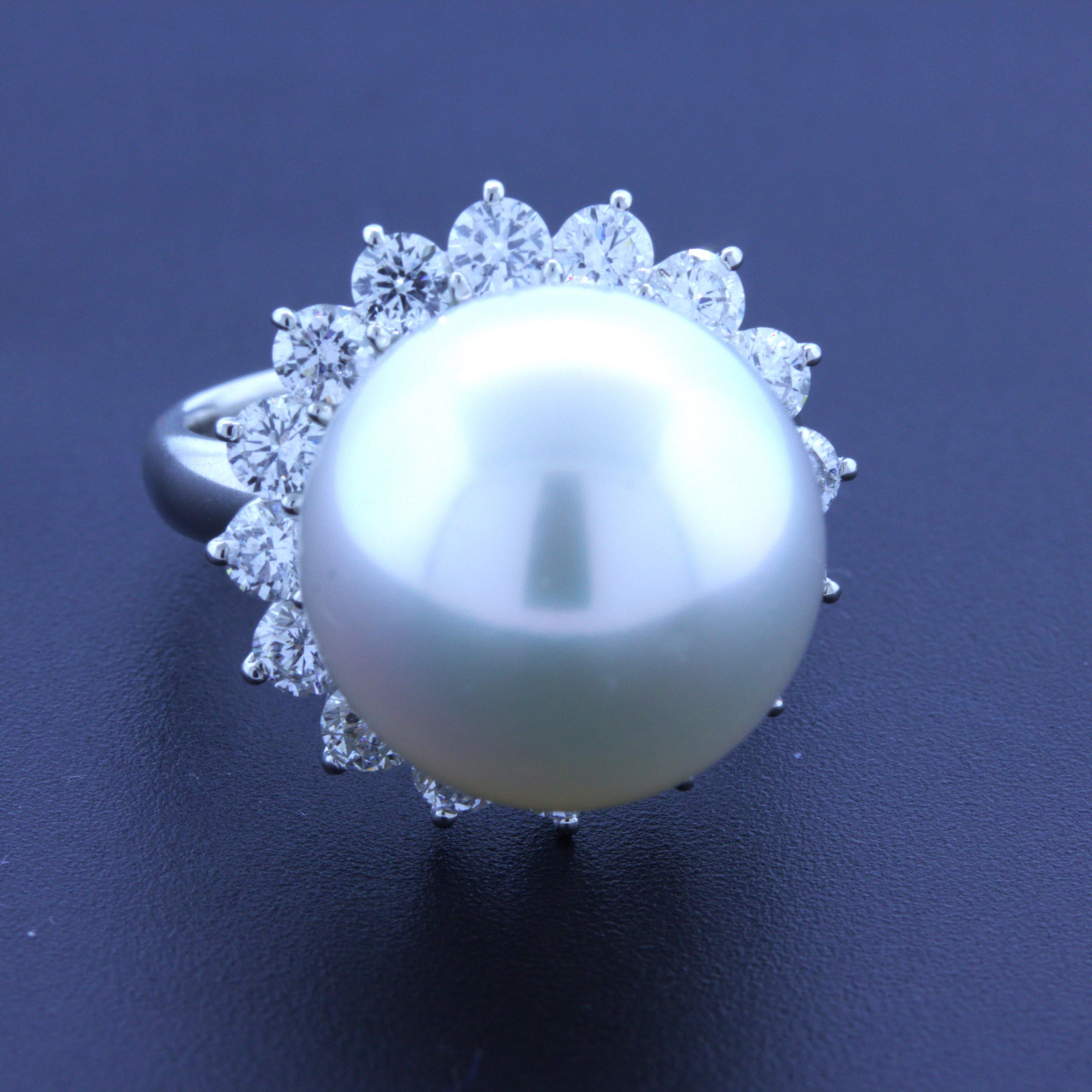 A very fine ring featuring an AAA quality South Sea pearl. What makes this pearl such fine quality is its combination of a perfectly round shape, strong luster and overtone, and its nacre quality which makes the pearl glow in the light. It is