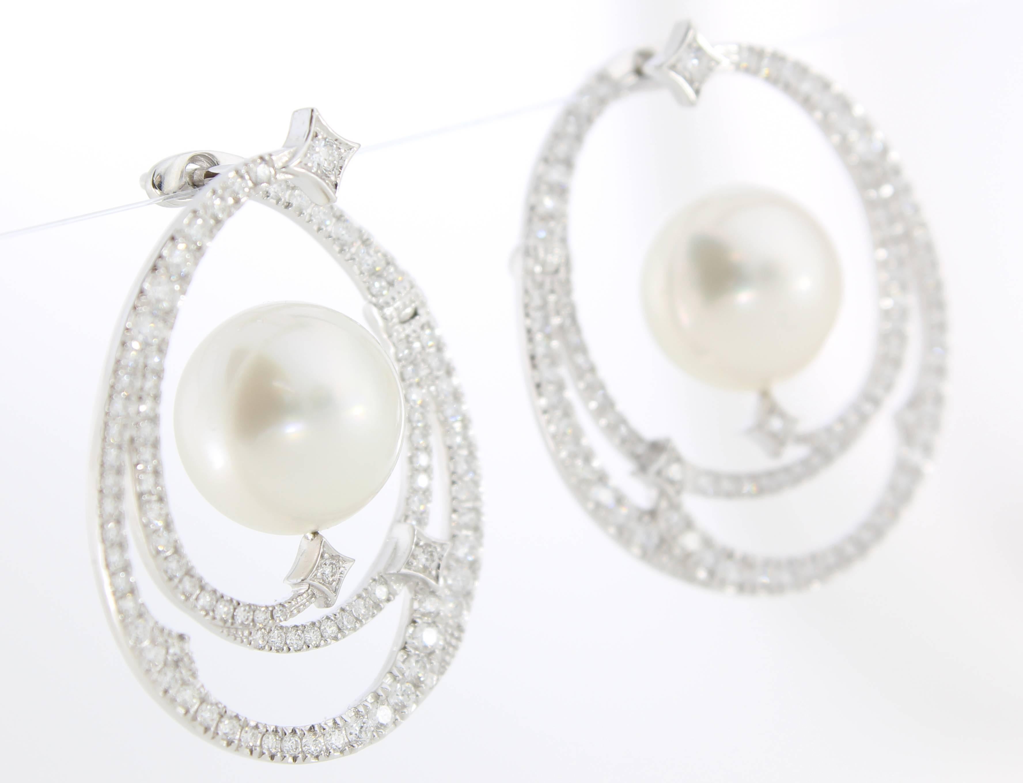 The Moondust Earrings are from the AUTORE Stars & Galaxies Collection. 
This piece is crafted in 18k White Gold with White Diamonds (H SI 1.747ct Brilliant Cut) and 12mm White South Sea Pearls. 