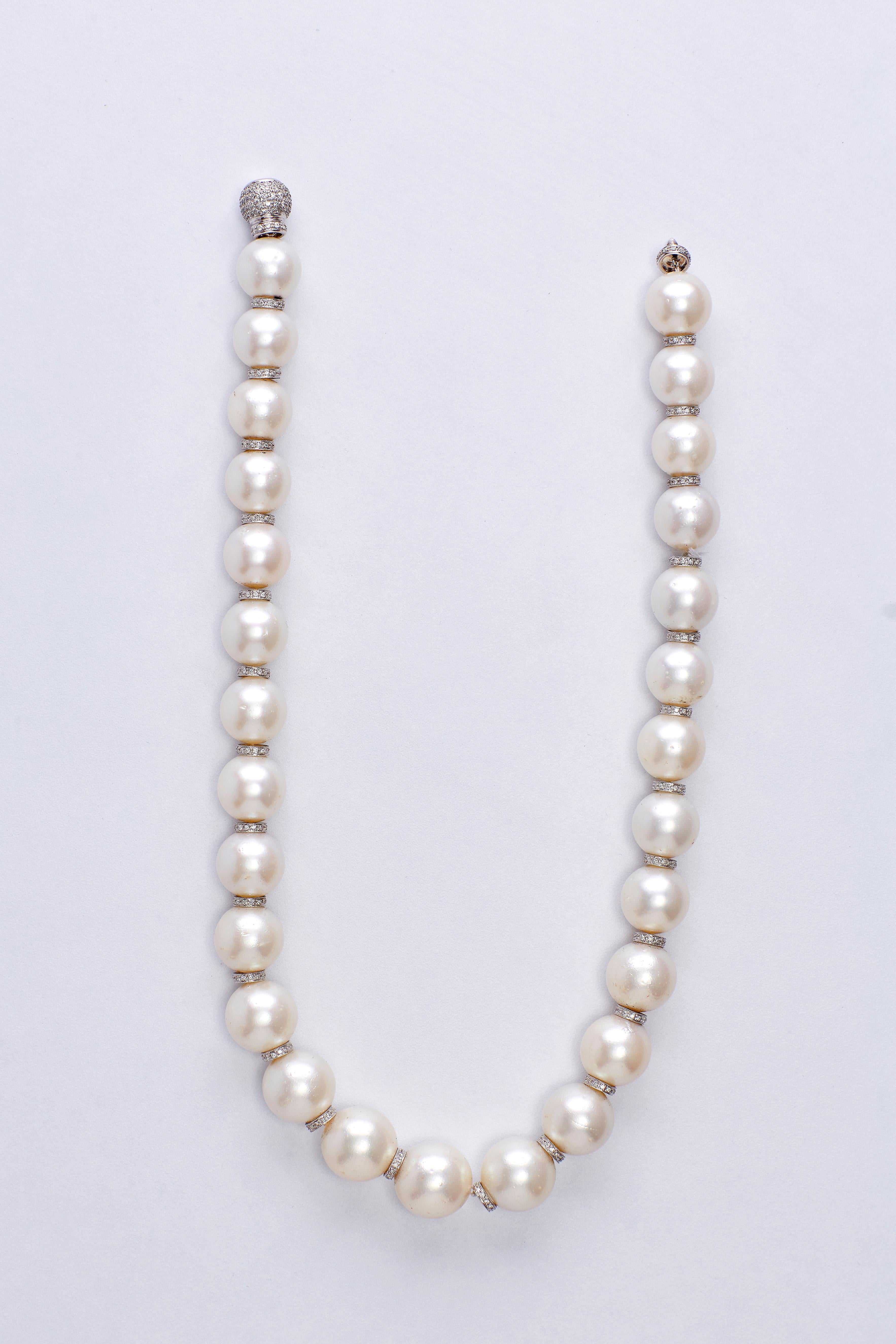 South Sea Pearl Diamond Rondelle Necklace
Timeless pearl necklace features a beautiful combination of 27 south sea pearls and 26 diamond rondelle 18k white gold spacers. Pearls are white color with a superior luster, 15-18 mm each. Clasp is 14k