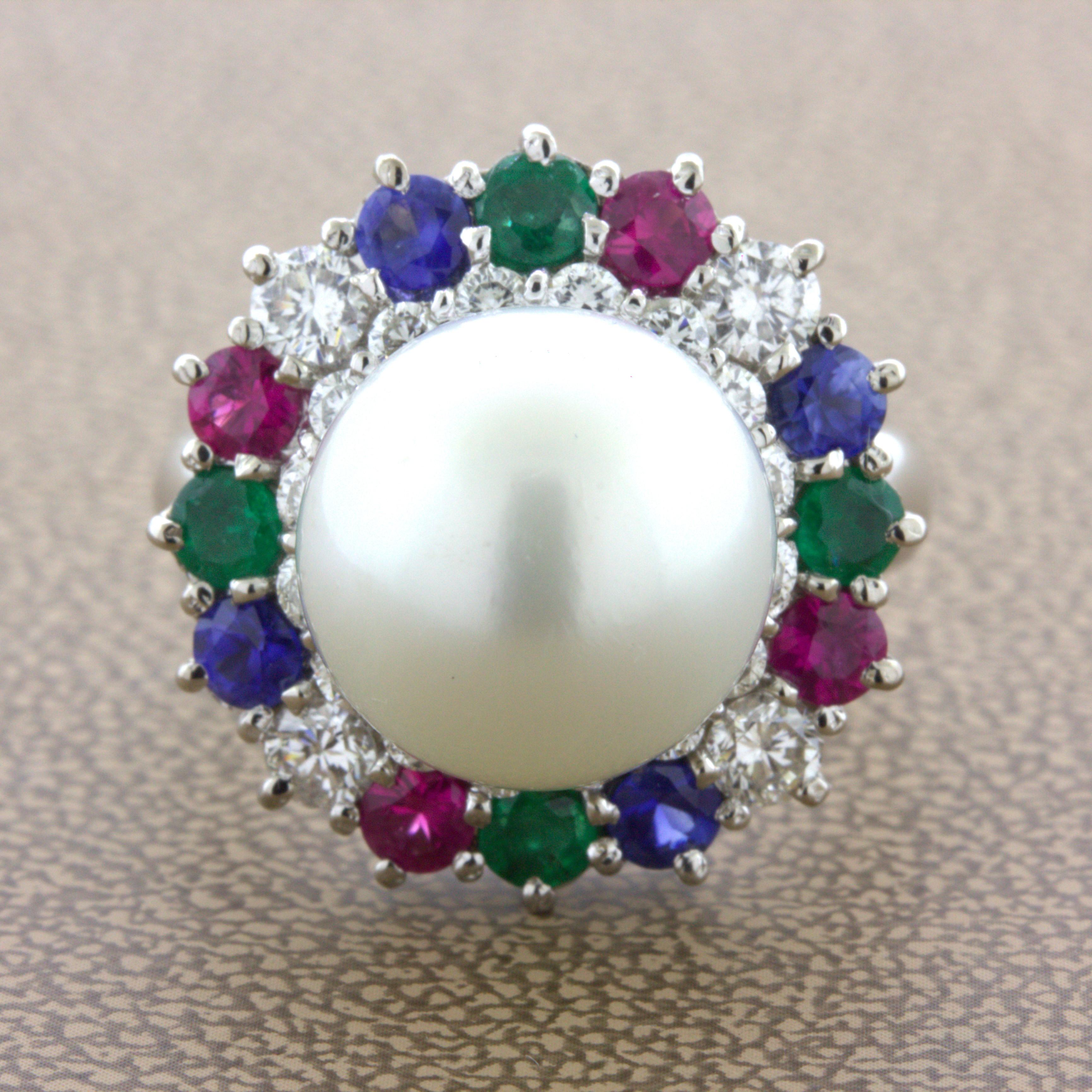A lovely platinum made ring full of sparkle and color! It features a 13mm south sea pearl with a soft glowing white color. It is surrounded by sparkles and colors, 1.17 carats of round brilliant-cut diamonds along with 1.81 carats total of rubies,