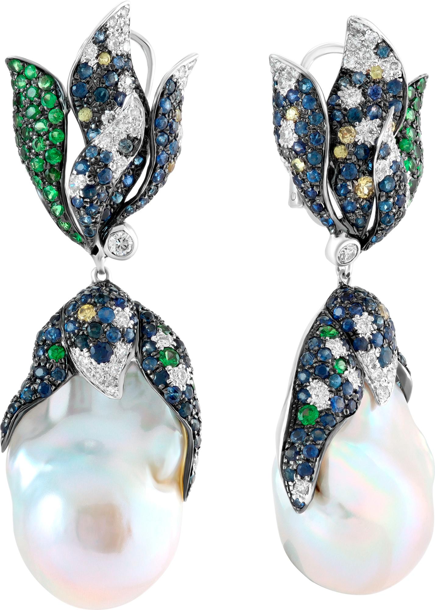 Oval baroque South Sea Pearl (16 x 16.50 mm) drop earrings with flame effect of round brilliant cut diamond, sapphire and peridot in 18k white gold. Post omega clip. 2.5 Inch hanging length.