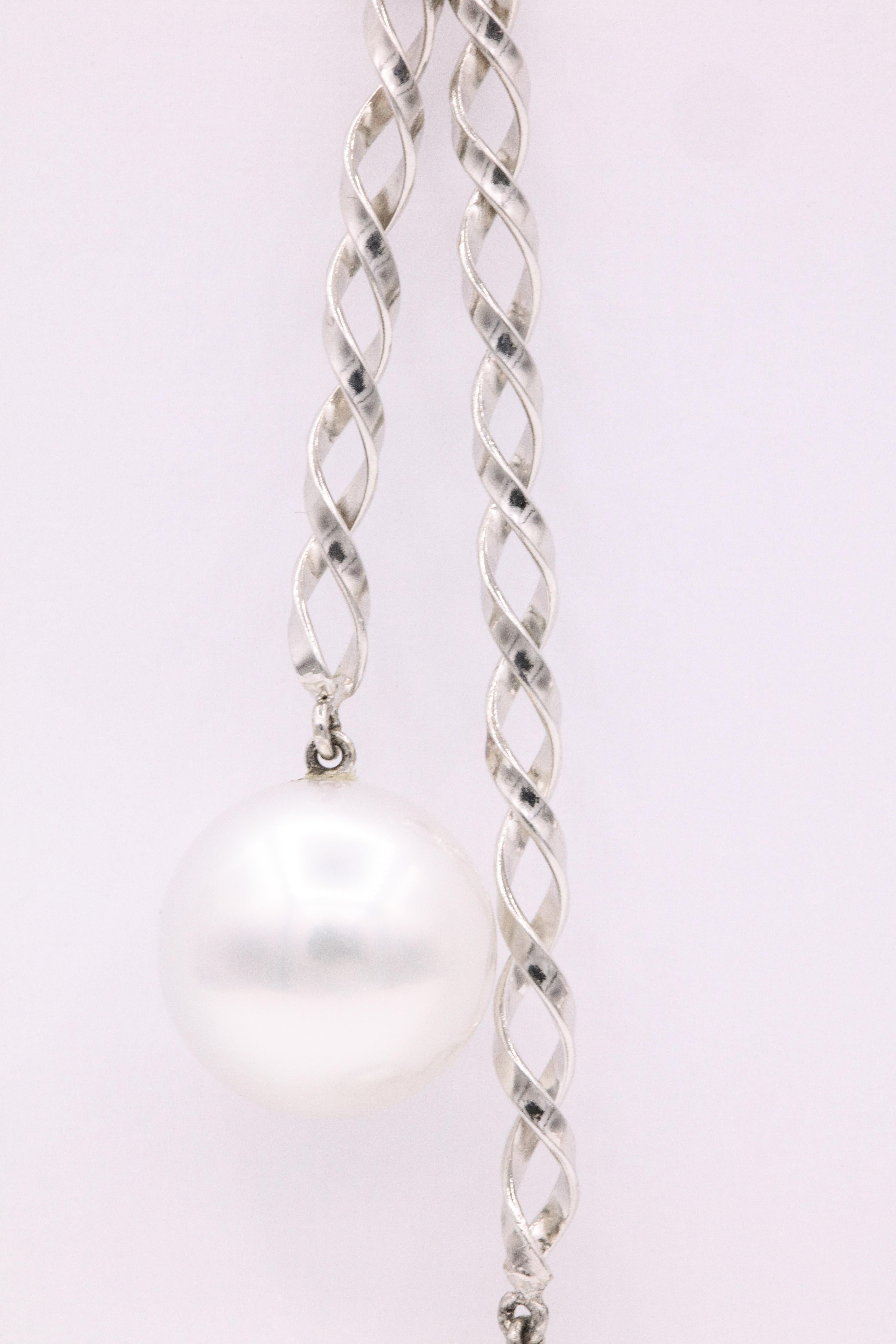 Women's South Sea Pearl Diamond Swirl Drop Earrings 0.10 Carats 14 Karat White Gold For Sale