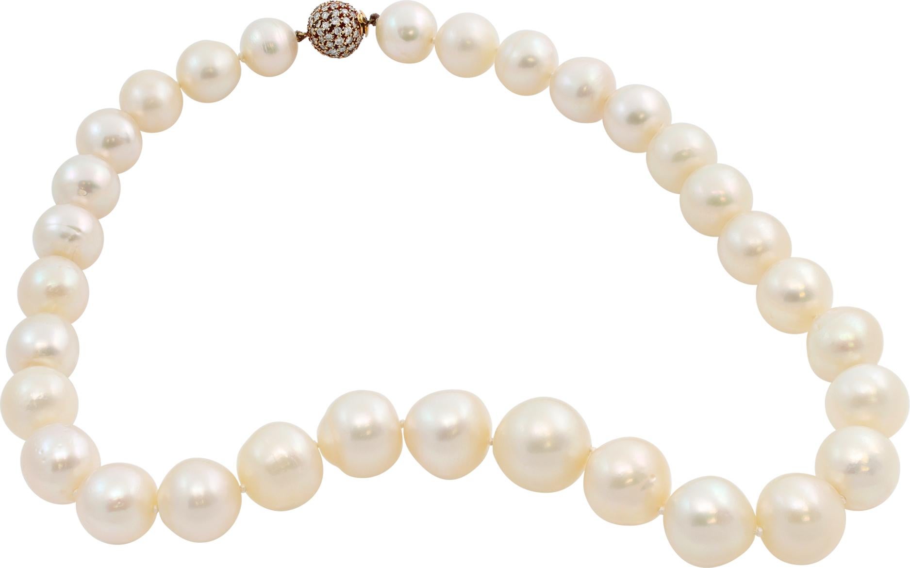 South Sea pearls necklace with a lovely white hue, graduating from 20mm to 14mm, with a pave diamond ball clasp in 18K yellow gold. 17 inches long.