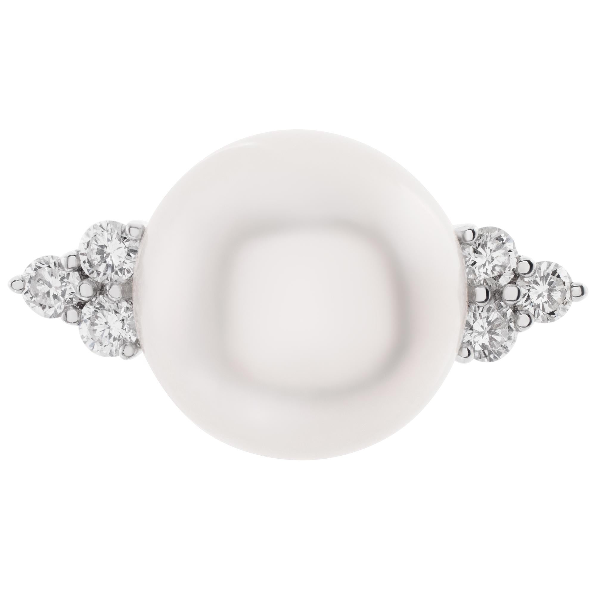South Sea pearl & diamonds ring set in 18K white gold. South Sea pearl: 15 x 15.5mm. Round brilliant cut diamonds total approx weight: 0.36 carat, estimate: G-H color, VS-SI clarity. Size 6.75This Pearl/diamond ring is currently size 6.75 and some