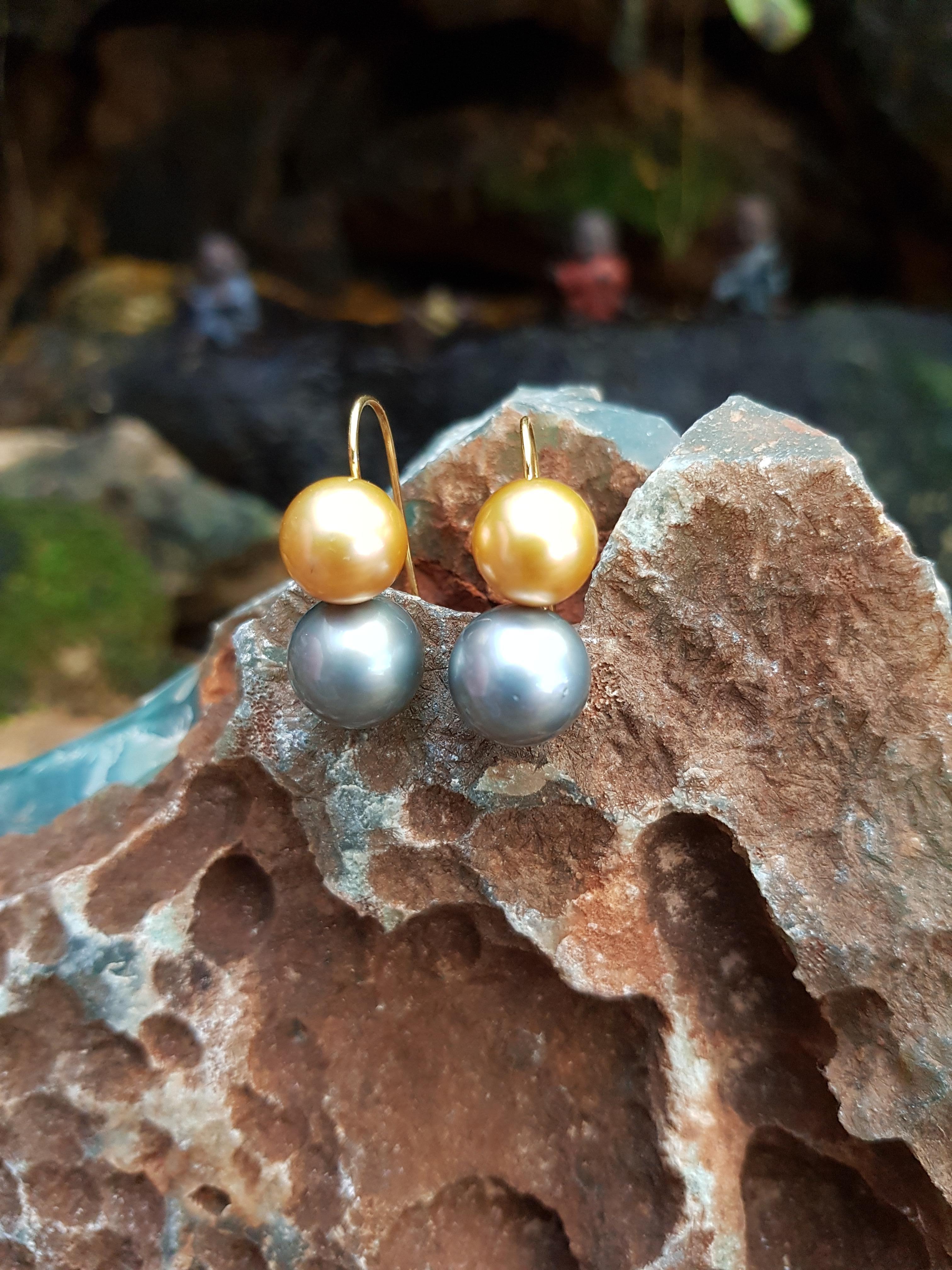 pearl earrings in gold setting
