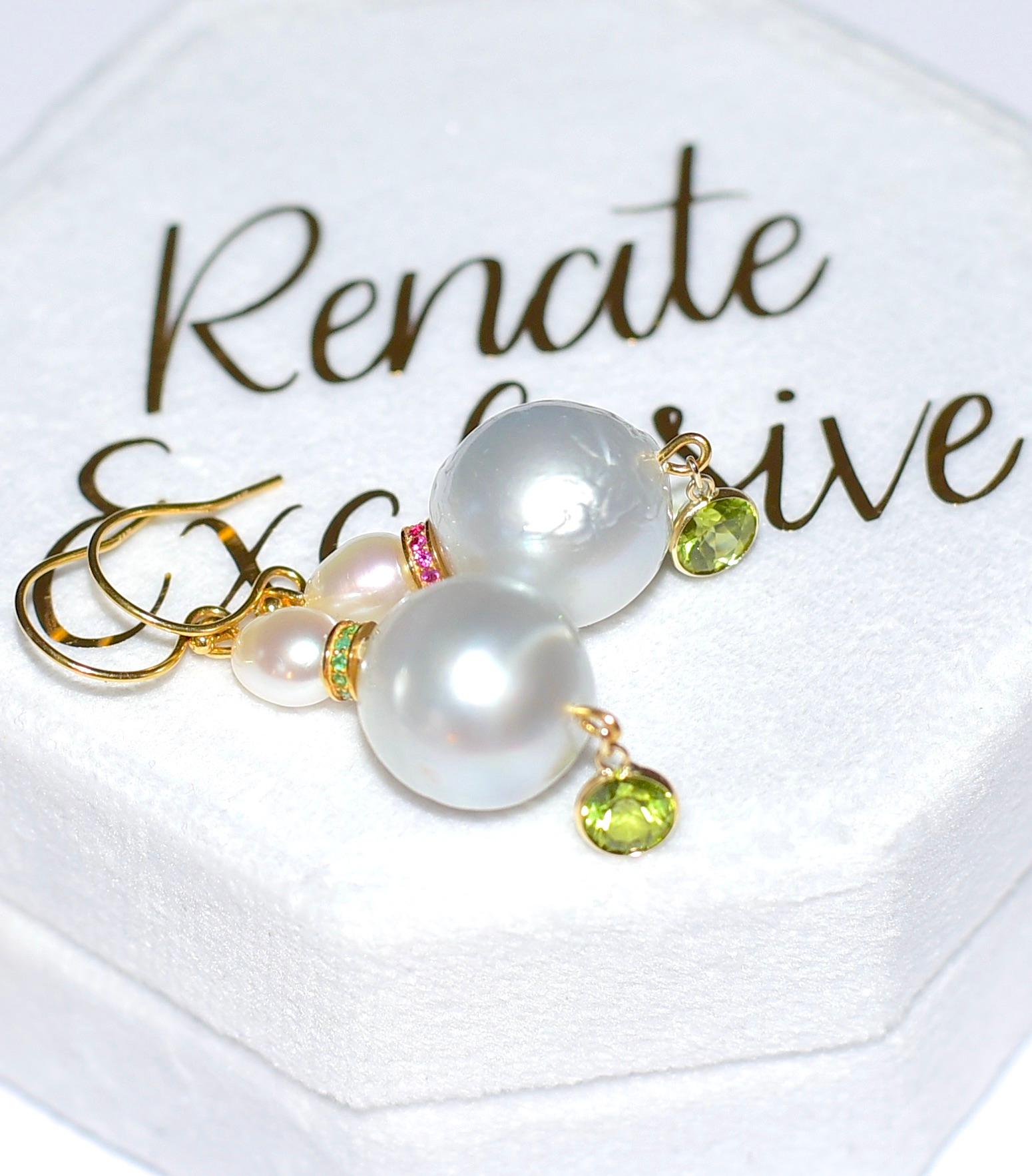 Huge White South Sea Cultured Pearl (14mmx15mm). with elegant two-tone 18K Solid Yellow Gold Bead cup and 14K Solid Yellow gold ear wires. 
Two-tone eternity beads are fun! (Natural Ruby and Emerald) and little Peridot bezel bead makes look even