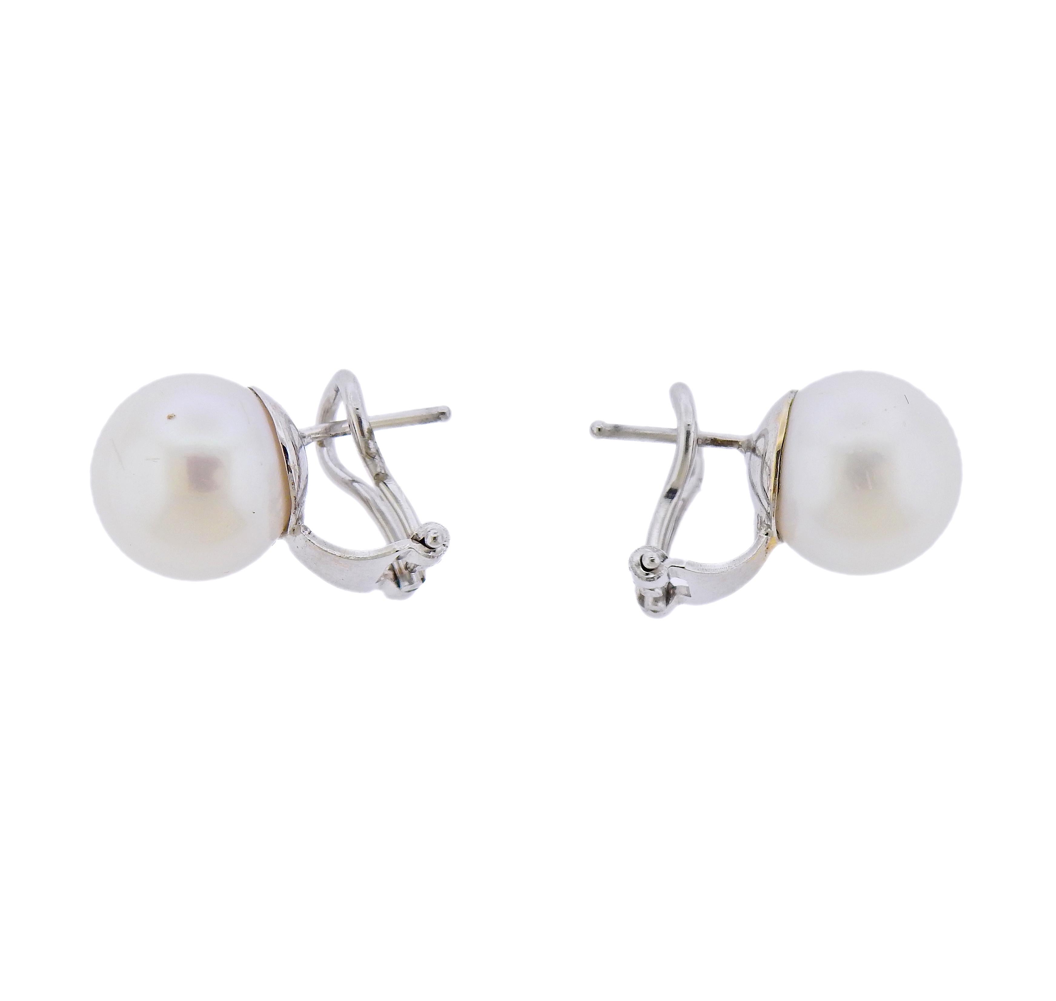 Pair of 18k white gold earrings with 11.5mm South Sea pearls. Marked: 750. weight - 7.1 grams. 