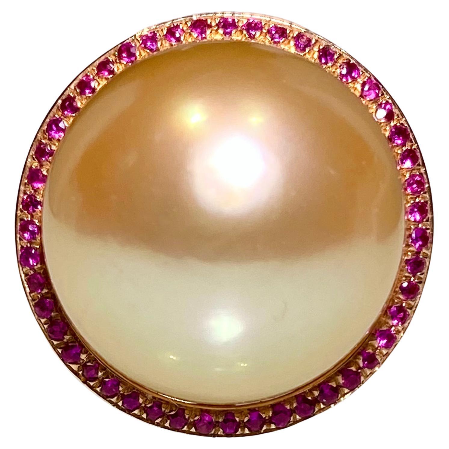 Bague pendentif Eostre en or rose 18 carats, perle des mers du Sud dorée et rubis 