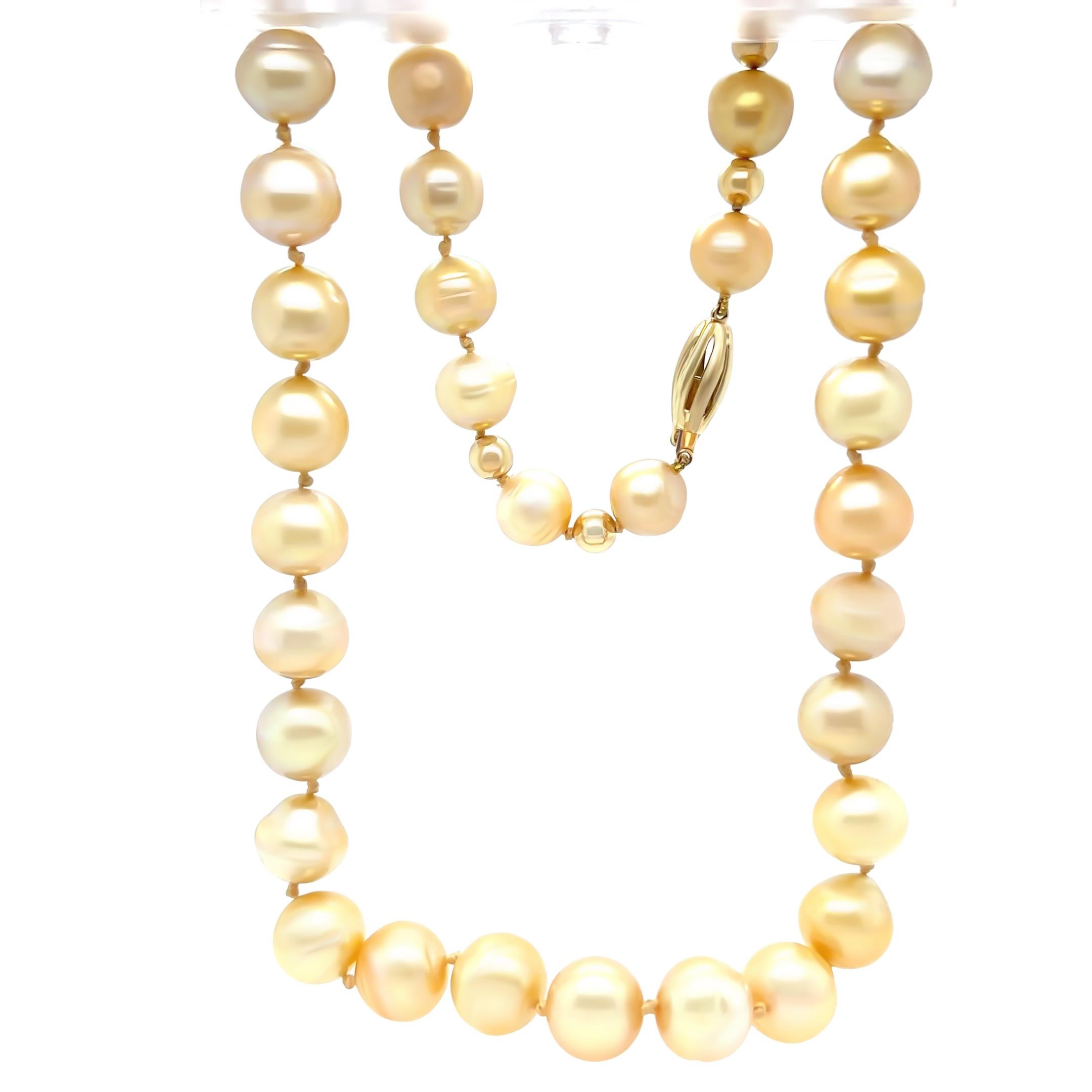 A string of South Sea pearls weighing 75.8 gm with a 14ct yellow Gold clasp. The necklace has 37, 12 mm round, circle golden pearls. 50cm in length.

Metal: 14ct Yellow Gold Gold (clasp)
Carat: N/A
Colour: N/A
Clarity: N/A
Cut: Round
Weight: 75.8