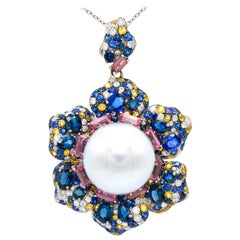 South Sea Pearl in a Sapphire and Diamond Flower Pendant