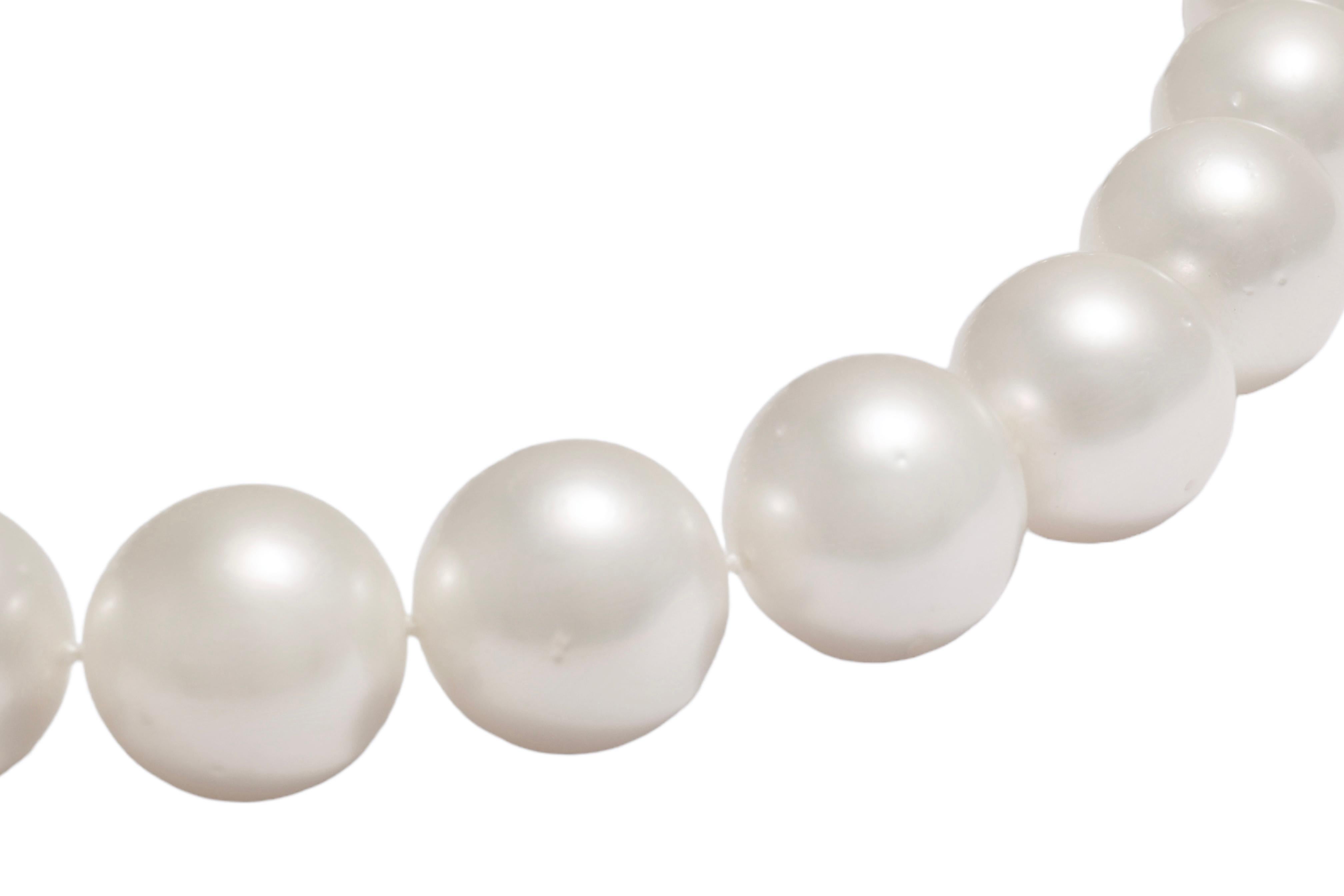 Gorgeous Natural South Sea Pearl Necklace With 18 kt. White Gold Locker set with 2.28 ct. Black & White Diamonds. 

Pearls: White round south sea pearls, biggest pearl diameter 16.5 mm, smallest pearl diameter 14.8 mm

Diamonds: Brilliant cut black