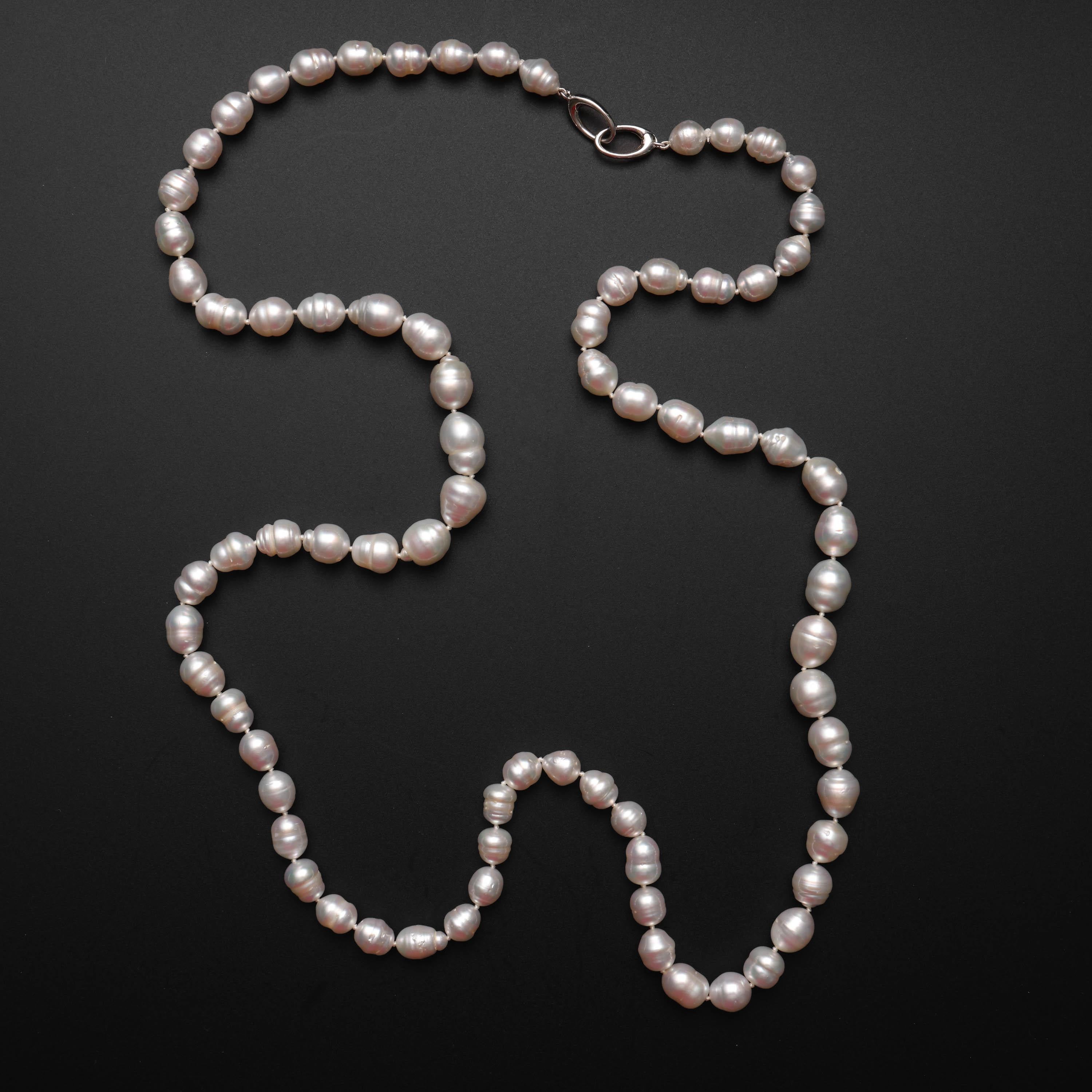 A spectacular opera-length South Sea pearl necklace. This gorgeous brand-new necklace features high-quality cultured baroque South Sea pearls with thick nacre and stunning orient -that's the iridescent play of light that some pearls with thick nacre