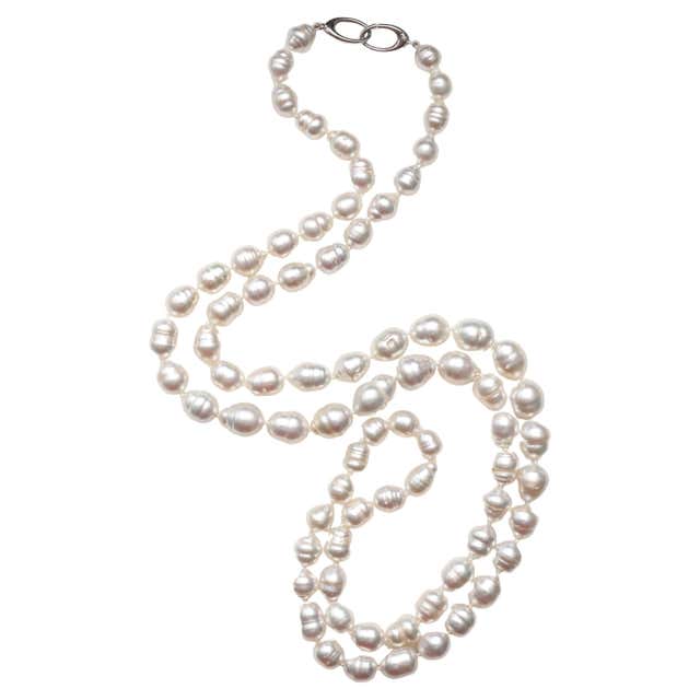 Opera Length Pearls with Gold and Diamond Flower Clasp For Sale at ...