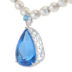 South Sea Pearl Necklace with Diamond Spacers and 266.58CT Blue Topaz Pendant